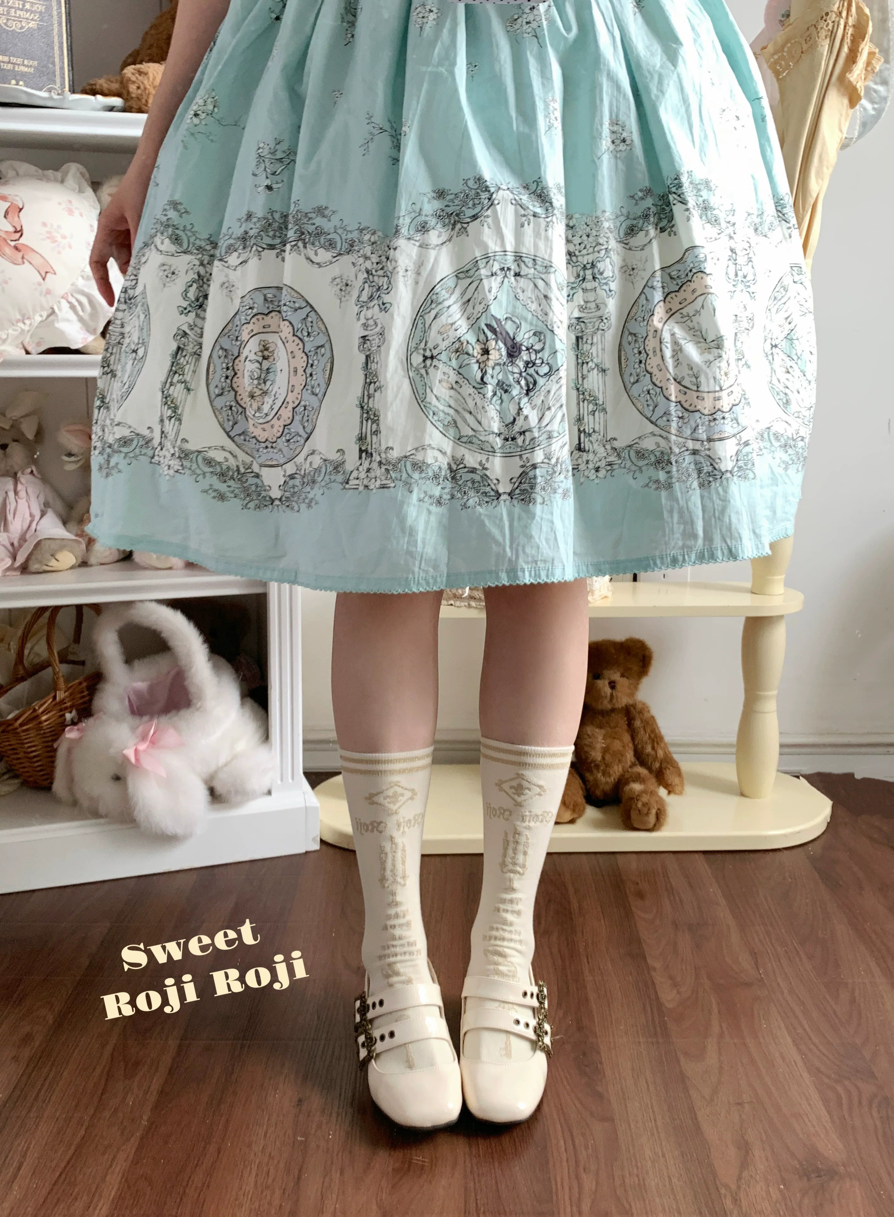 Jirai Kei ivory vintage mid-calf socks with printed patterns paired with mint green Lolita skirt and Mary Jane shoes