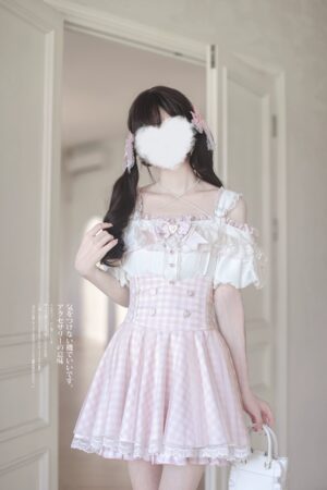 Ryousangata pink gingham off-shoulder halter blouse with lace trim and layered skirt front view on model wearing white platform heels indoor doorway setting Jirai Kei fashion