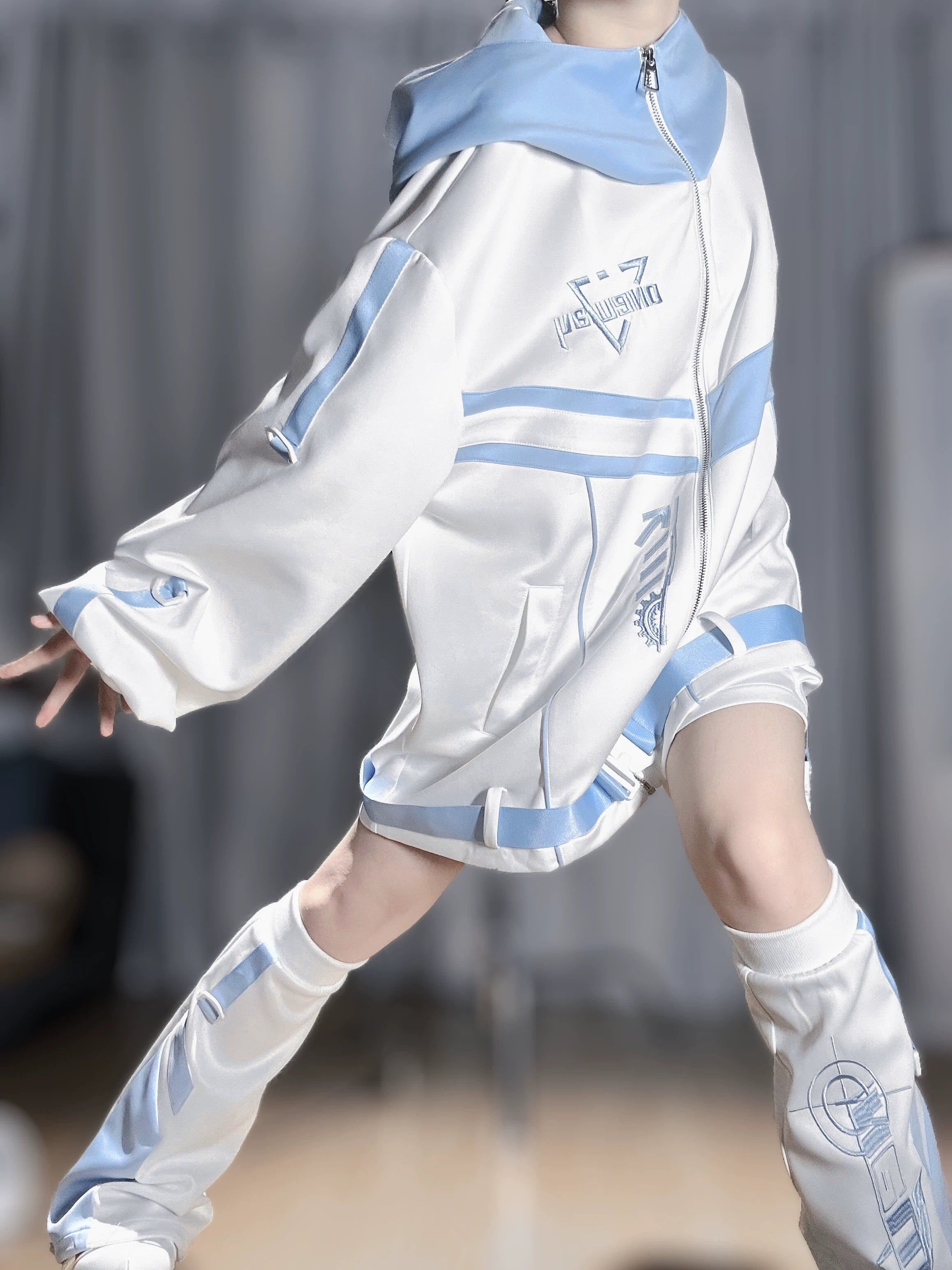Tenshi kaiwai techwear hoodie left side partial view showcasing oversized loose sleeves, blue stripe trims, detached leg warmers, and functional pocket design