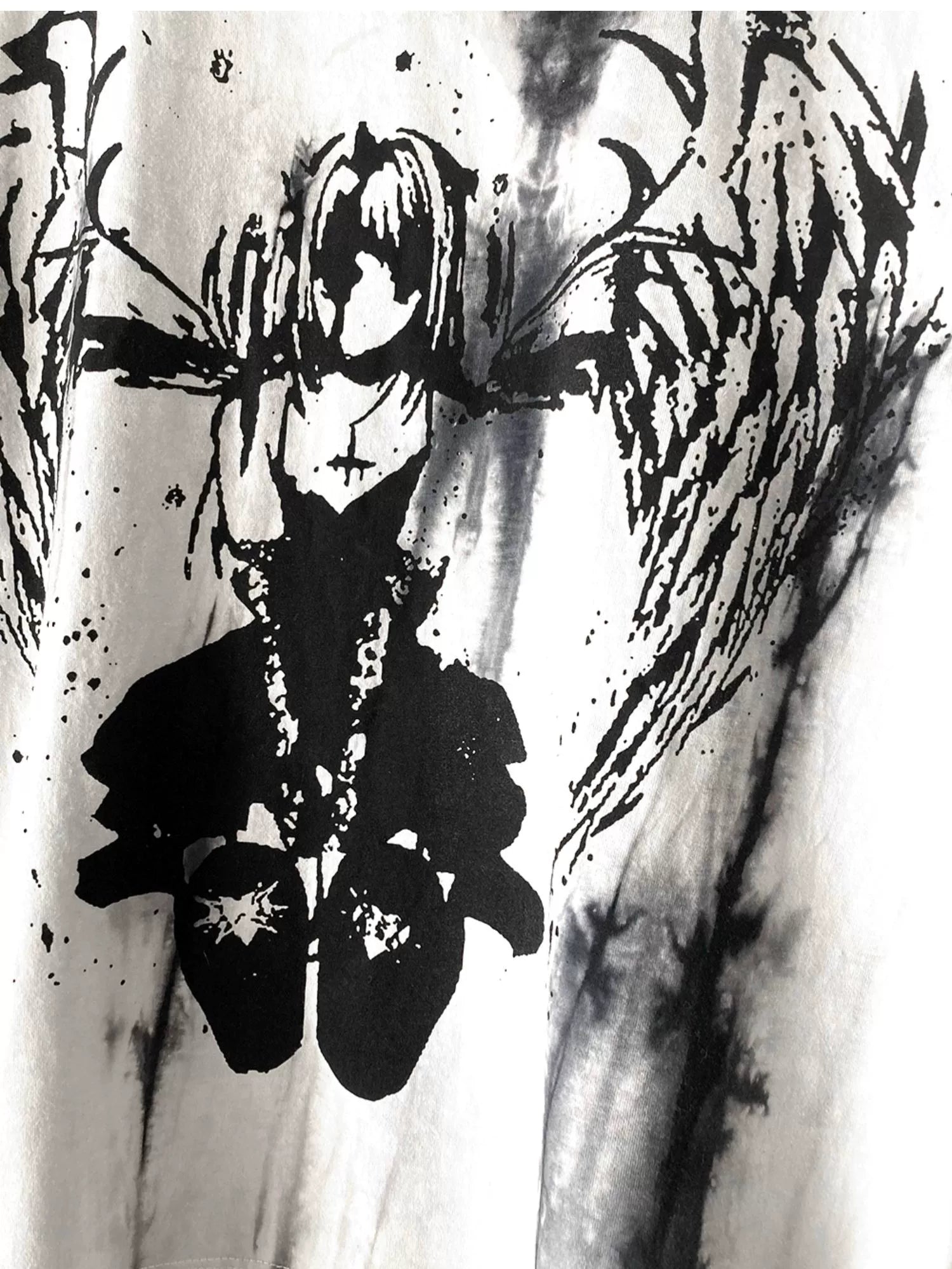 Worn styling example of tie-dye gothic jirai kei angel wings t-shirt demonstrating real-world fit and layering possibilities