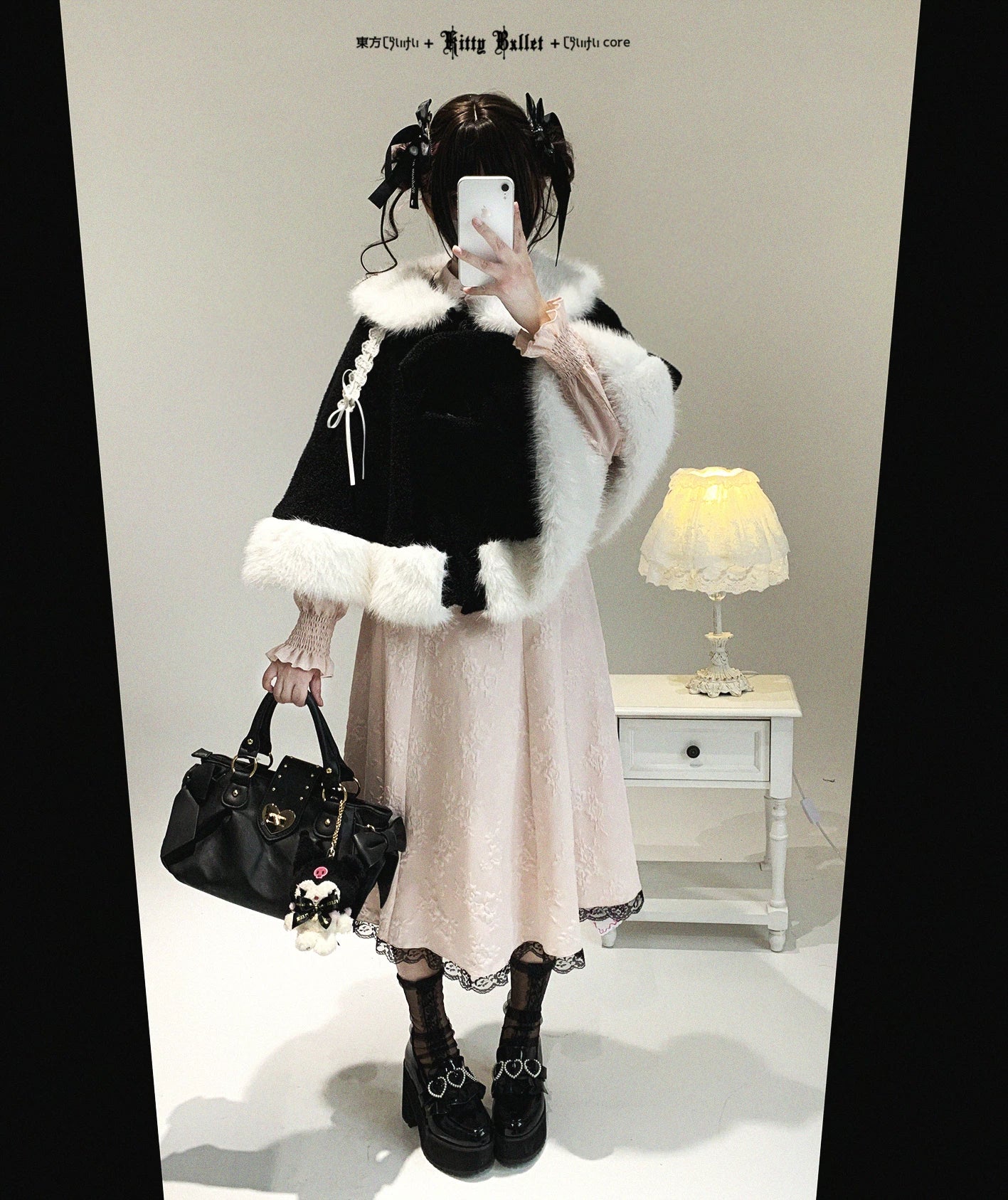 Jirai Kei bunny ear winter cape water-resistant polyester exterior showing durability in outdoor weather conditions