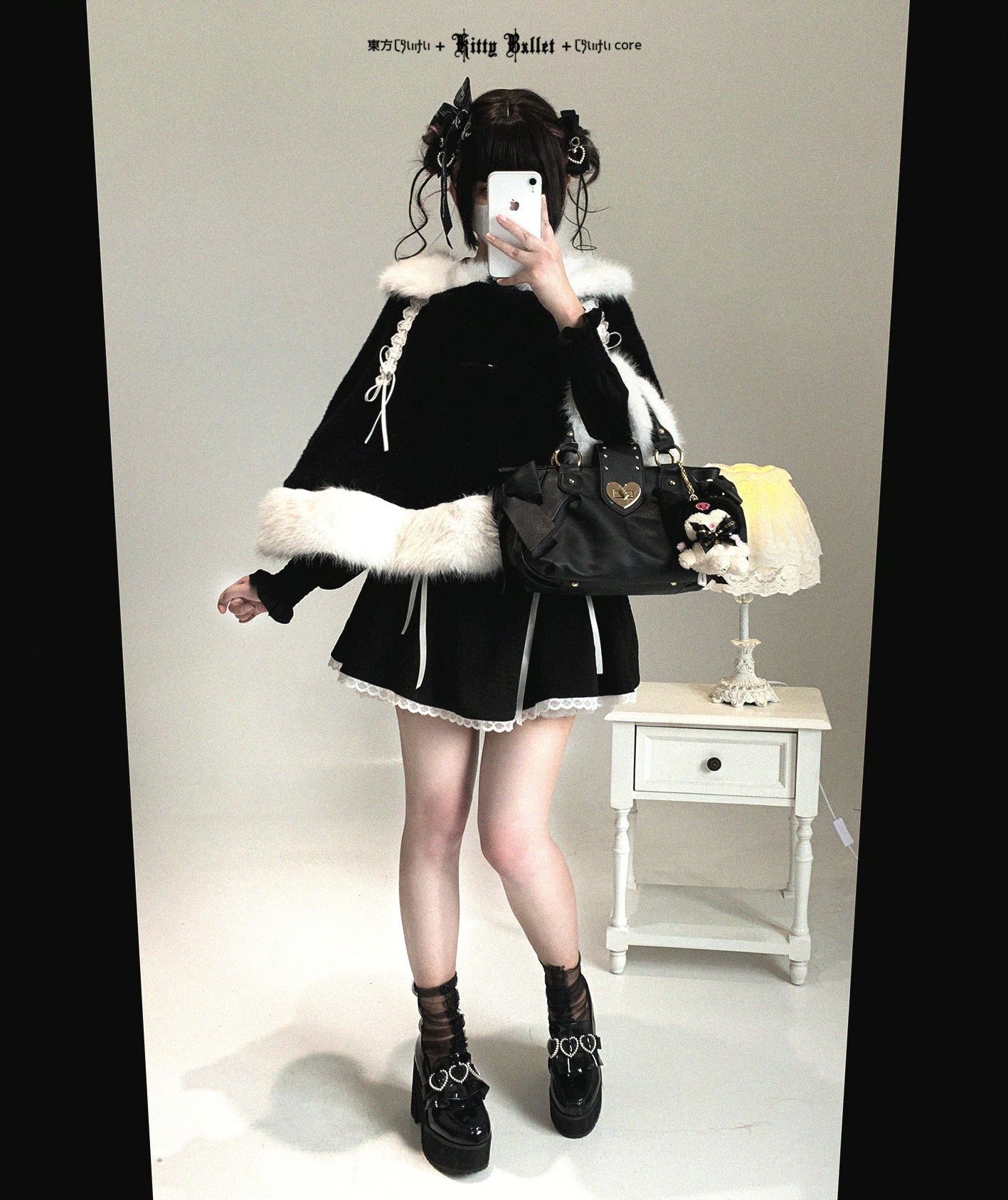 Jirai Kei bunny ear winter cape indoor mall fashion styling showing real-world casual wear application