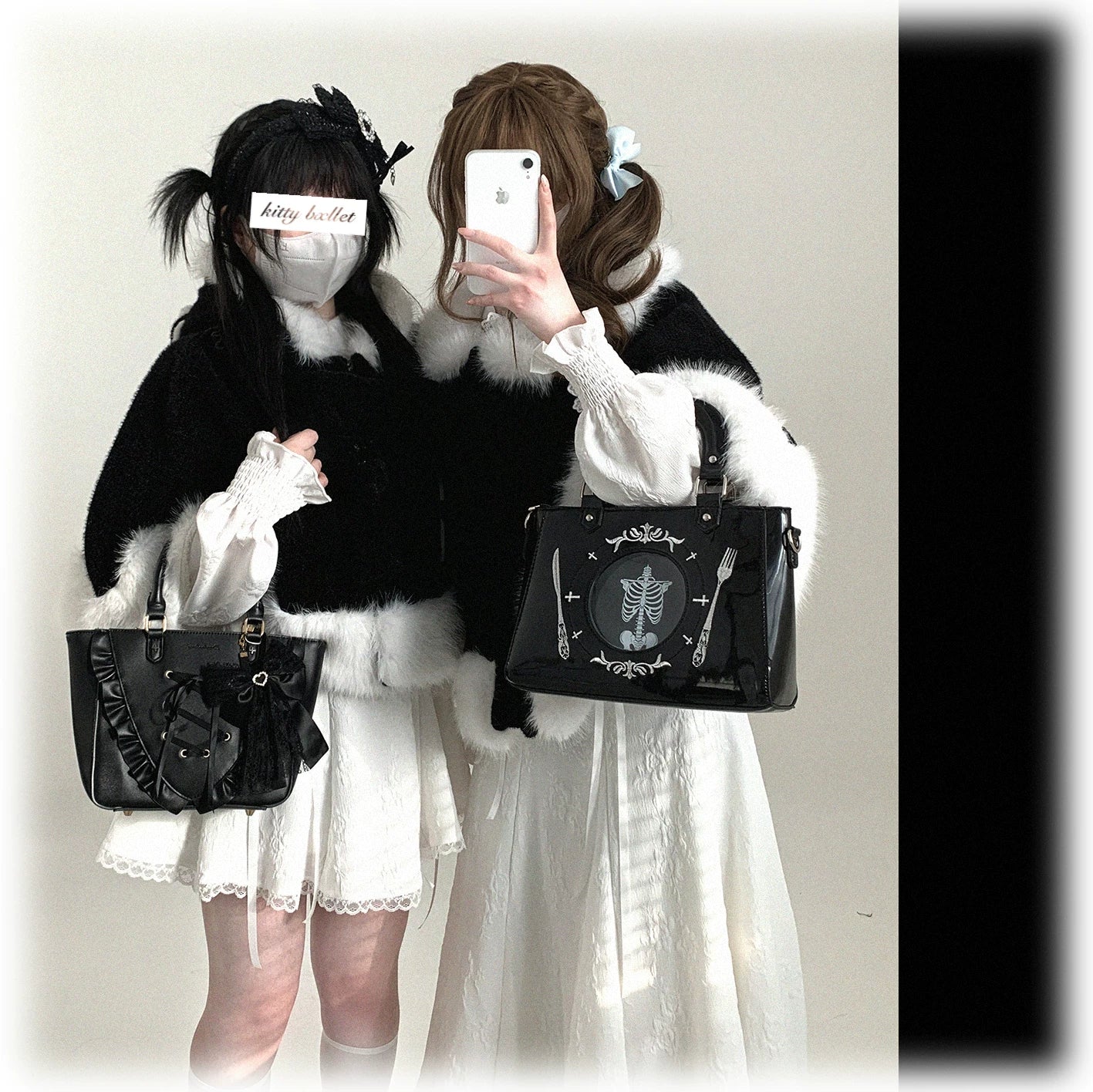 Front-facing model shot of cat-ear hooded cape highlighting hood shape, cat ear silhouette, and layering versatility for Jirai Kei outfits