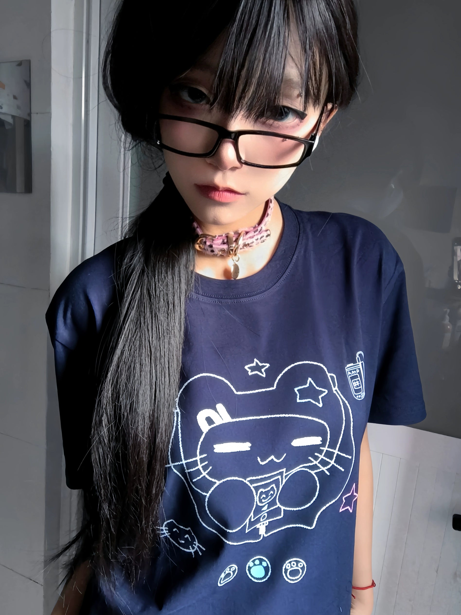 Navy blue Jirai Kei cat headset graphic T-shirt styled with multiple accessories and fashion-forward Jirai Kei aesthetic elements