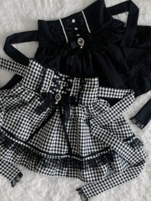 Jirai Kei two-piece skirt set with adjustable tie straps displayed on right side showing lace trim details and elastic waistband construction overhead flat lay
