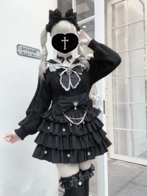Black sailor collar Jirai Kei sweater with lace trim and detachable bow, front full-body view on model wearing twin-tails and platform loafers, demonstrating the voluminous puff cuffs and layered ruffle skirt styling