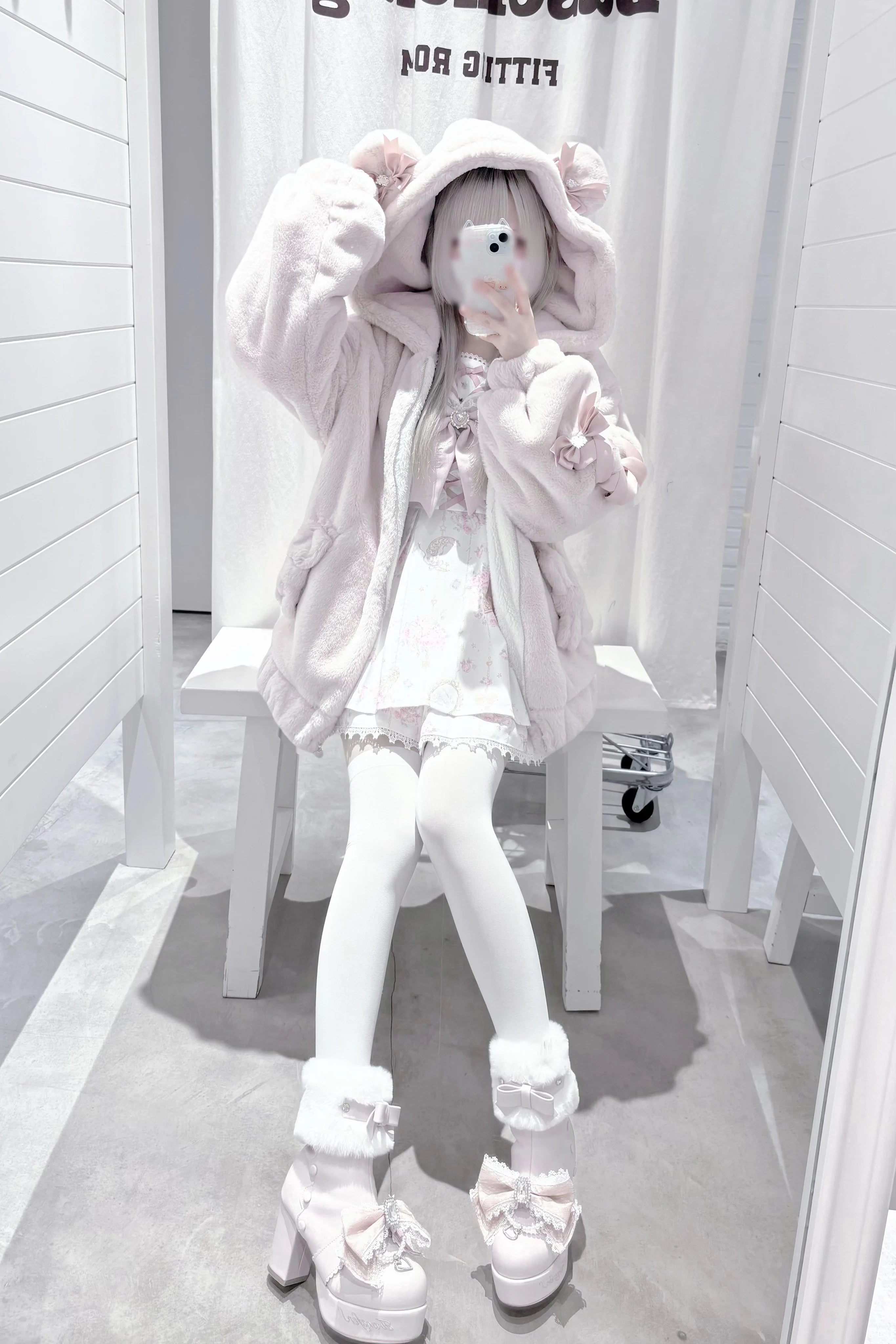 Off-white Ryousangata bear ear plush winter coat showing clean silhouette and versatile color option
