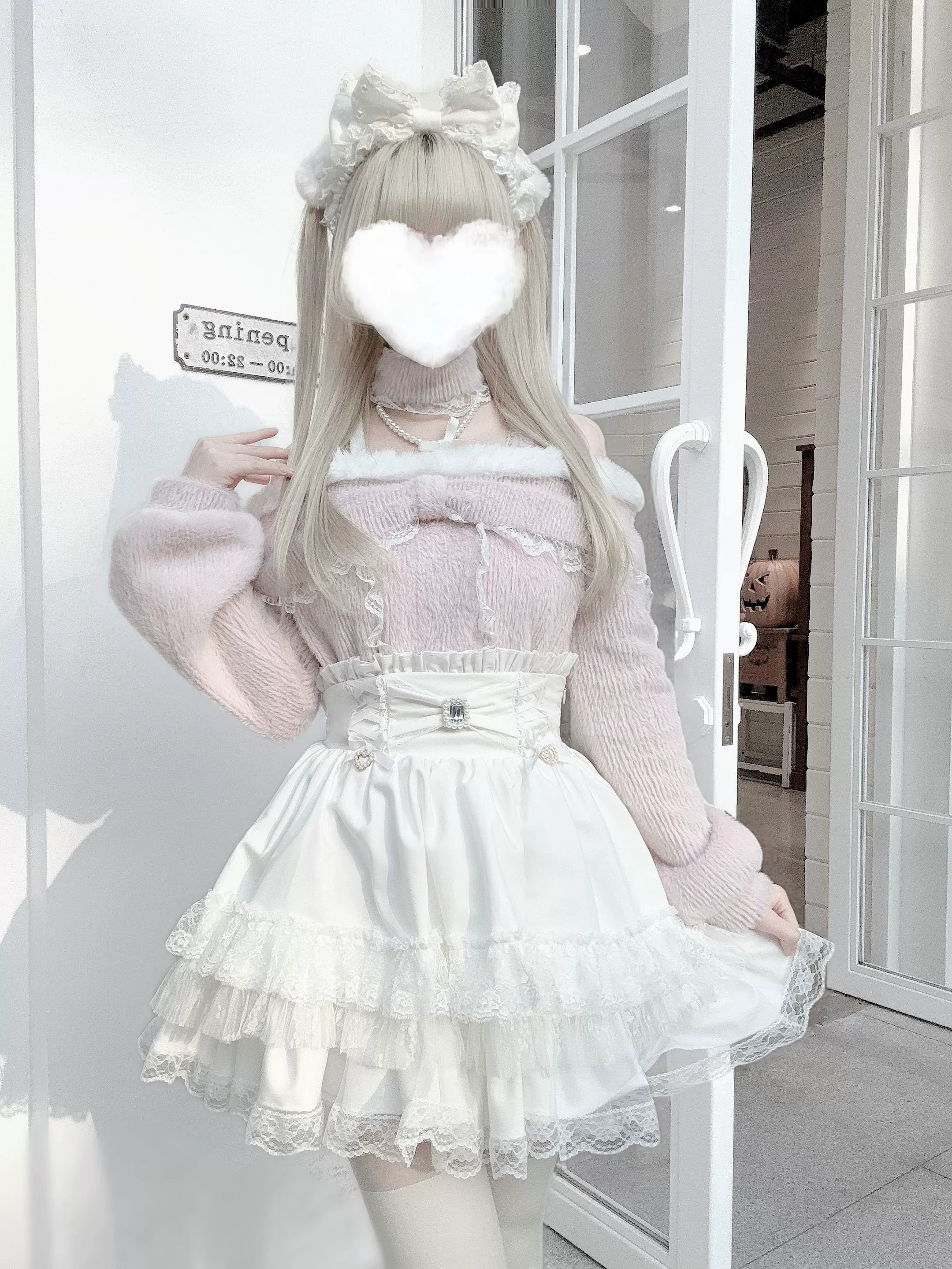 Size comparison of off-shoulder plush tops in multiple sizes displayed side-by-side showing fit variation and generous oversized silhouette