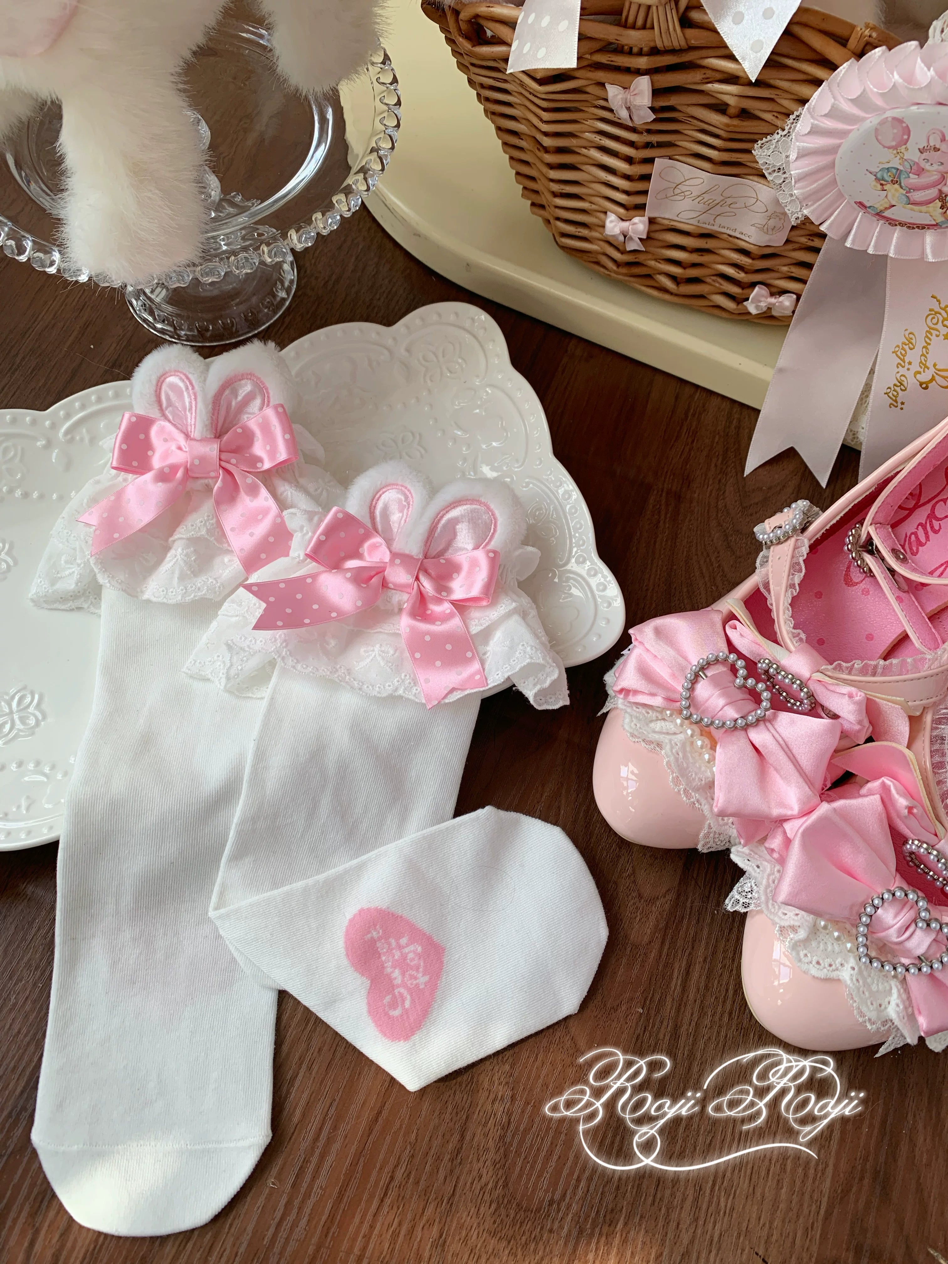 Jirai Kei water blue polka dot socks with white base worn with light pink flat shoes and blue gingham Lolita skirt in specialty shop setting