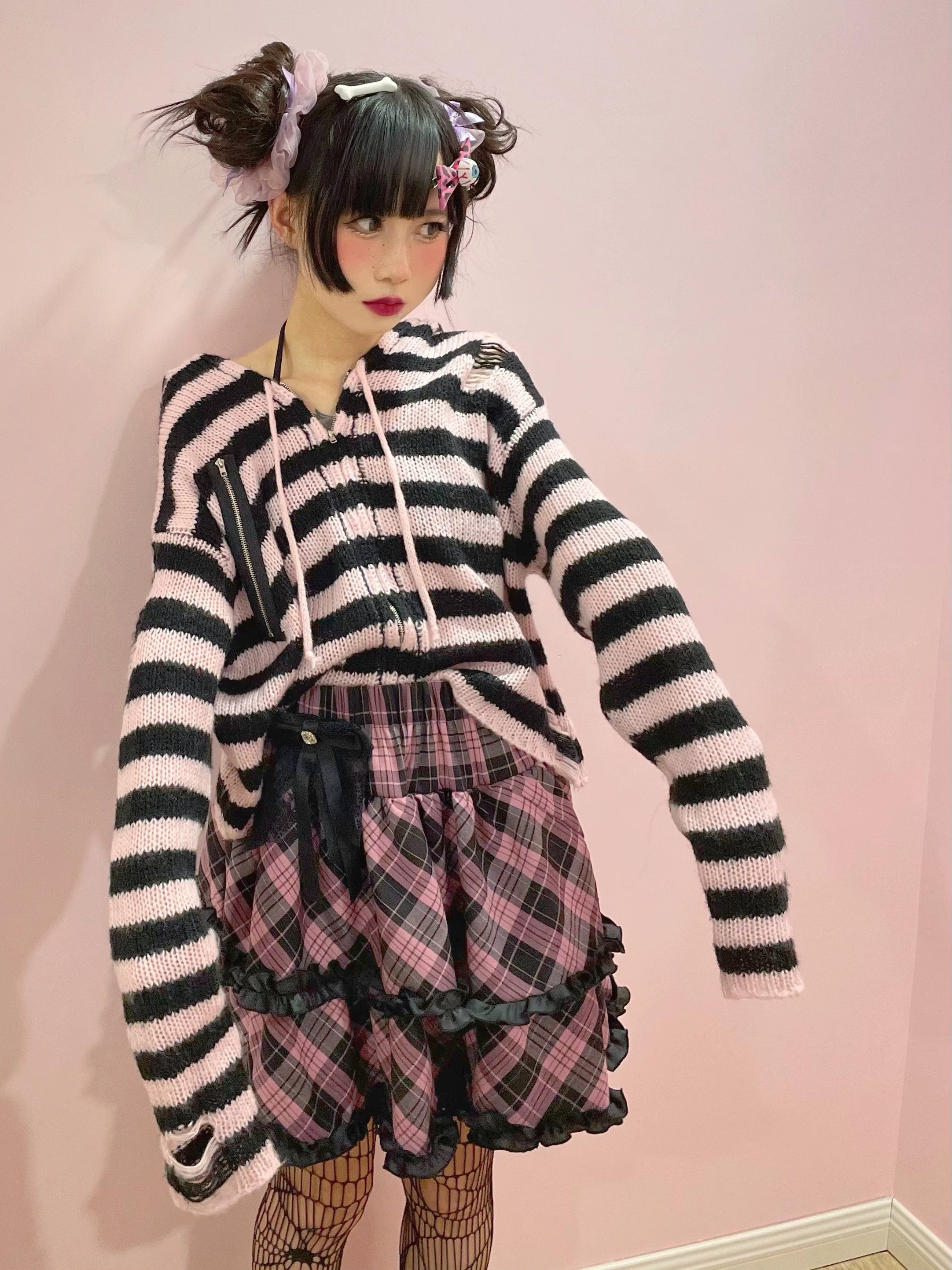 Blue-black plaid Jirai Kei ruffle skirt full-body display, pink hem contrast, high-waist fit, and dimensional ruffle layers