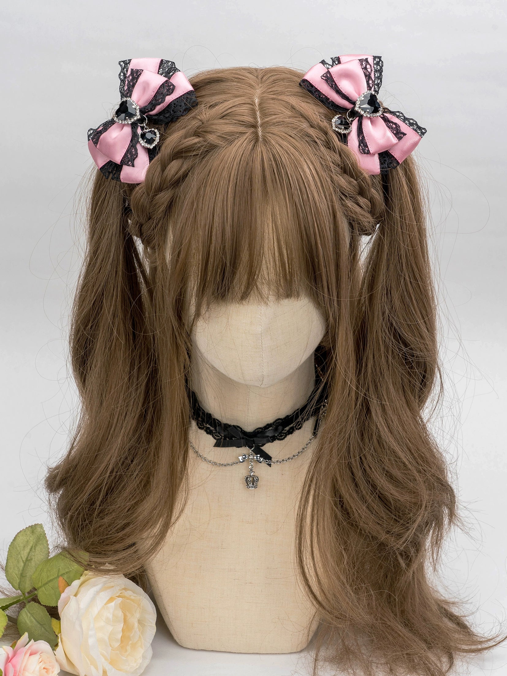 jirai kei bow hair clip dangling heart charm pendant jewelry-inspired detail close-up photography