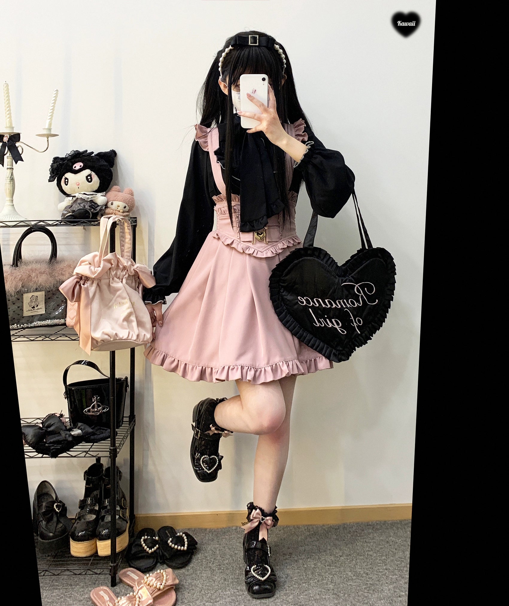 Side profile view Jirai Kei full outfit pink ruffled suspender skirt black ruffled blouse black heart-shaped bag and Mary Jane platform shoes