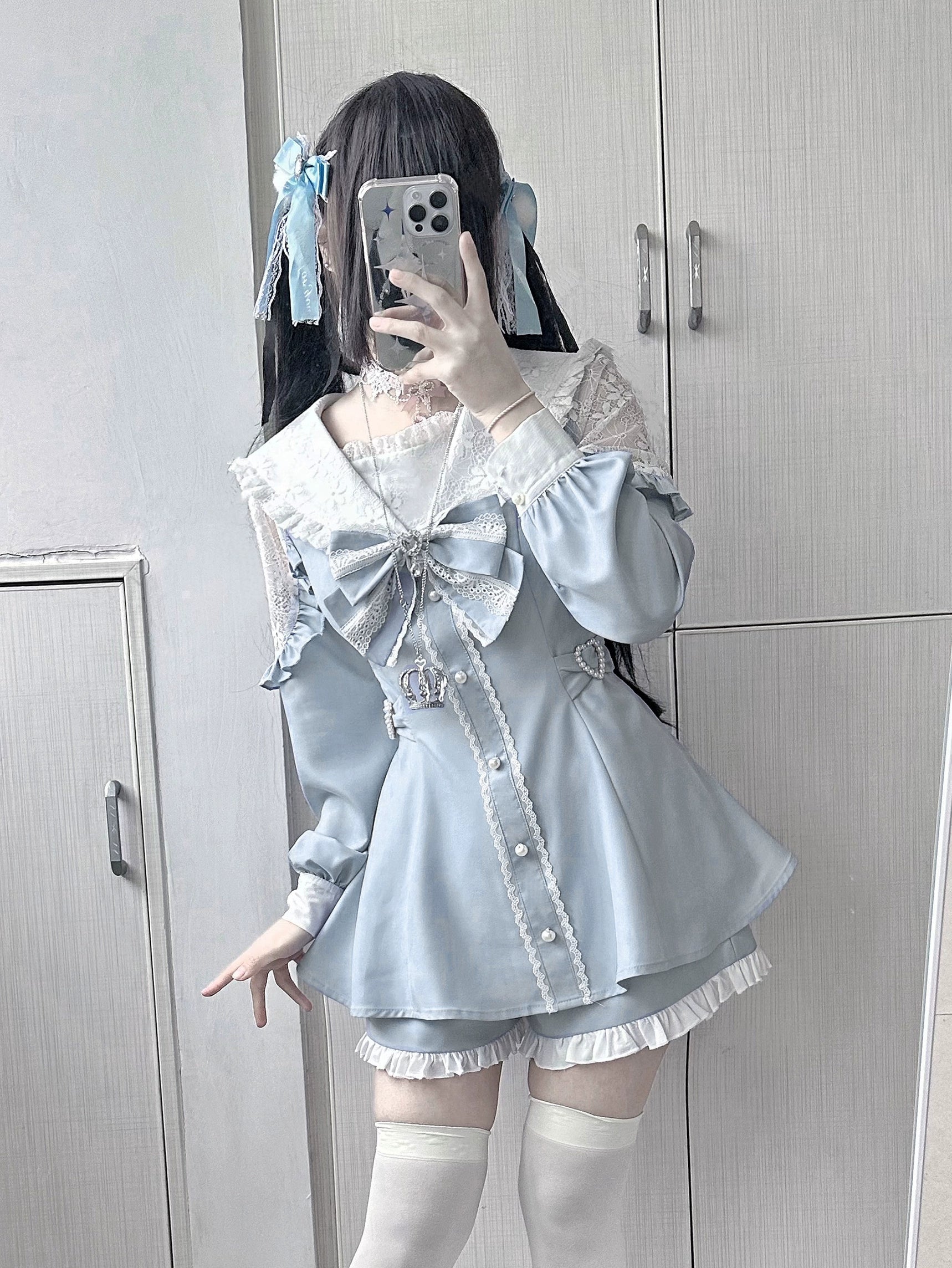 Light blue sailor Jirai Kei dress set front mirror selfie with blue hair clips over-knee white socks a-line skirt