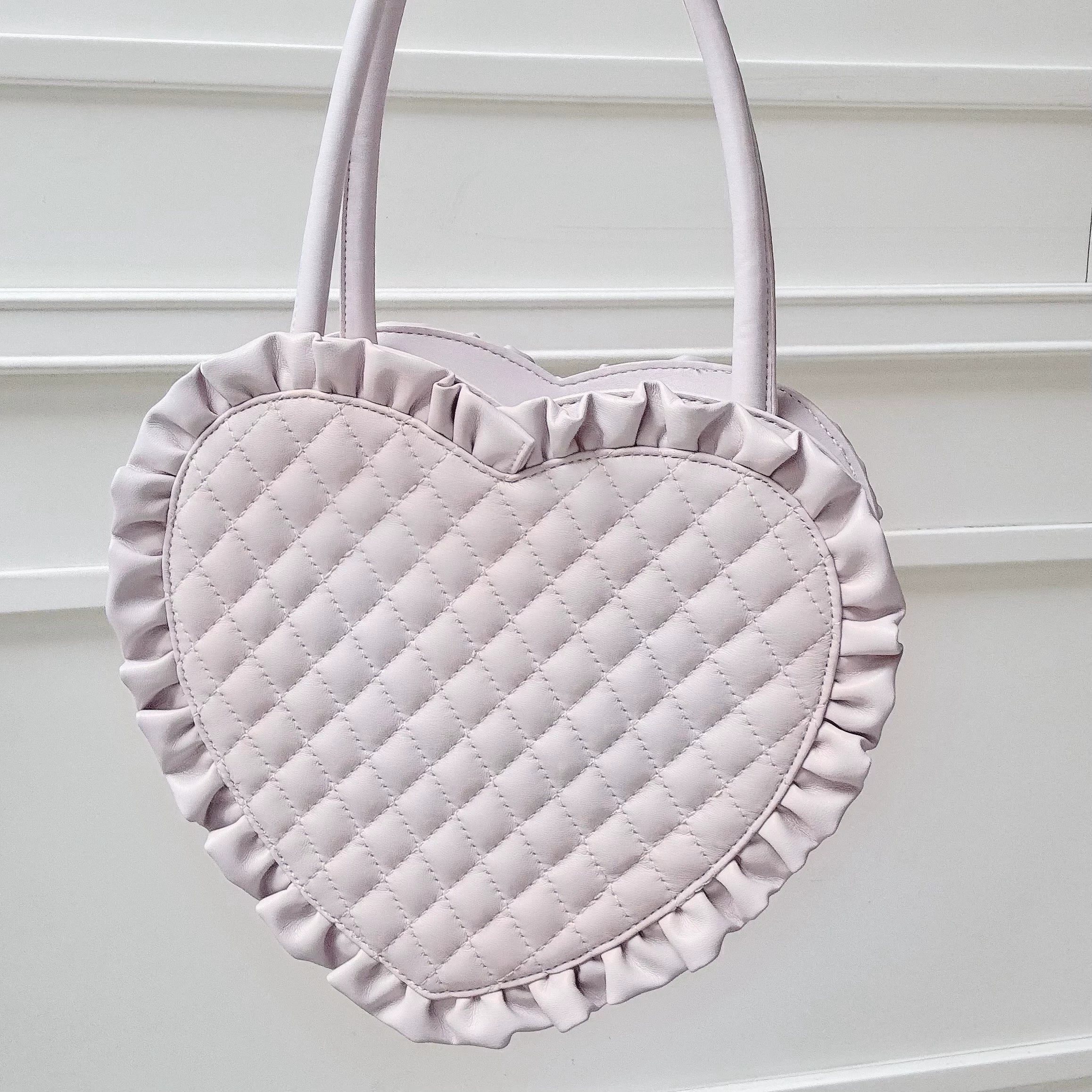 Jirai Kei heart-shaped itabag care and maintenance guide showing cleaning instructions and product longevity tips for PU material and acrylic window