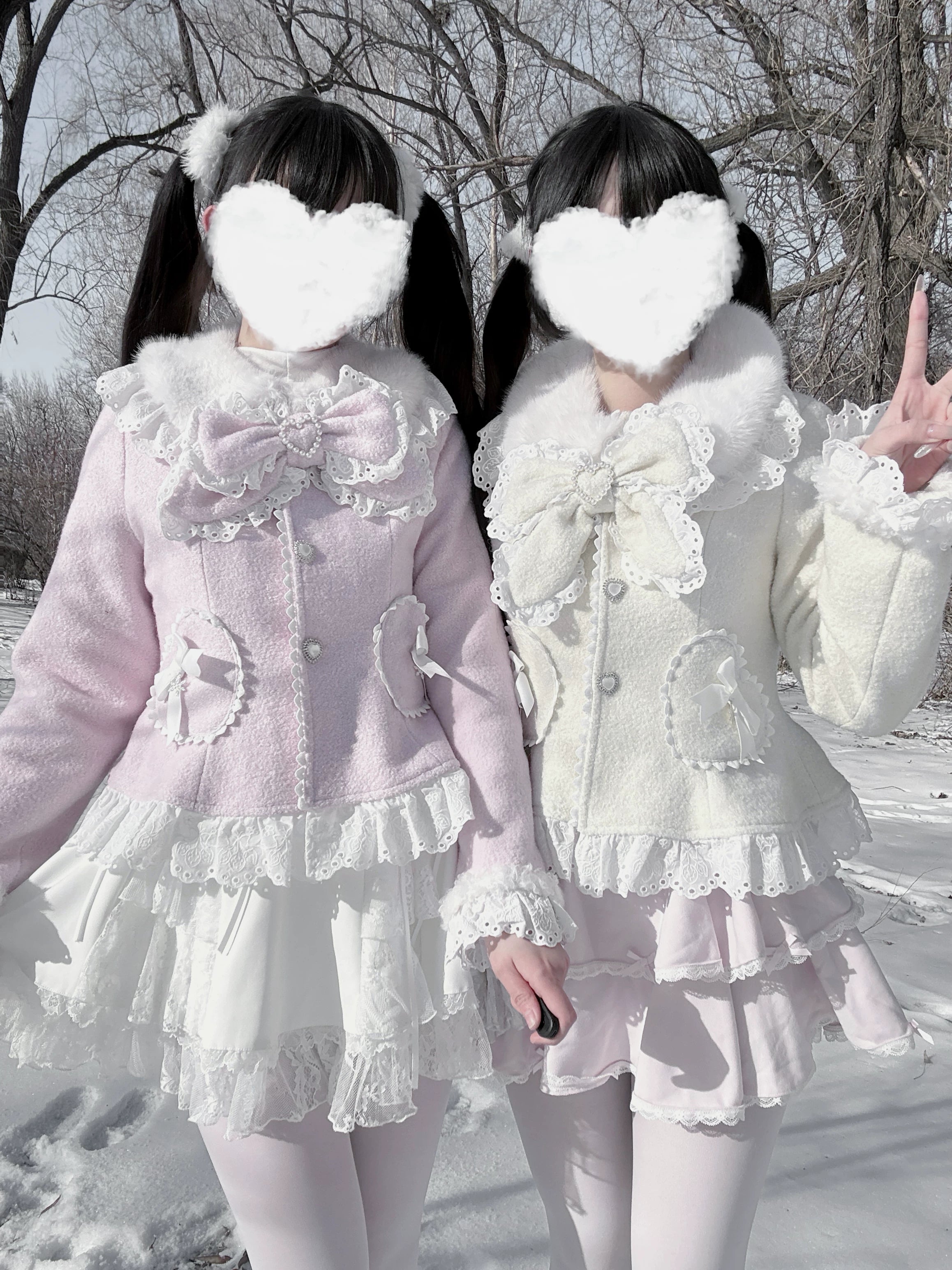 Sweet Jirai Kei wool-blend Ryousangata short coat with heart pockets and lace trim, front view on two models wearing matching pink and cream outfits in snowy park setting