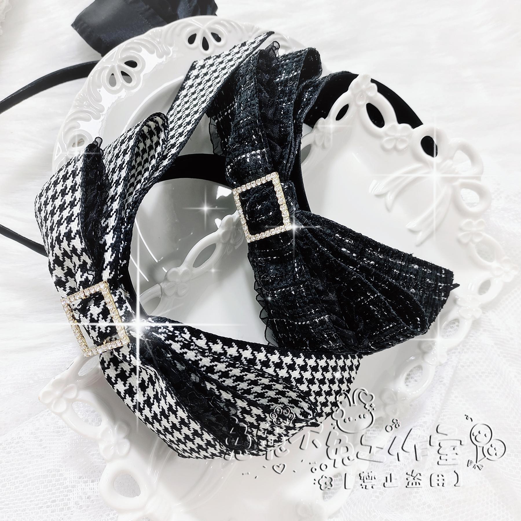 Black tweed and houndstooth pattern Jirai Kei bow headbands displayed on white porcelain plate