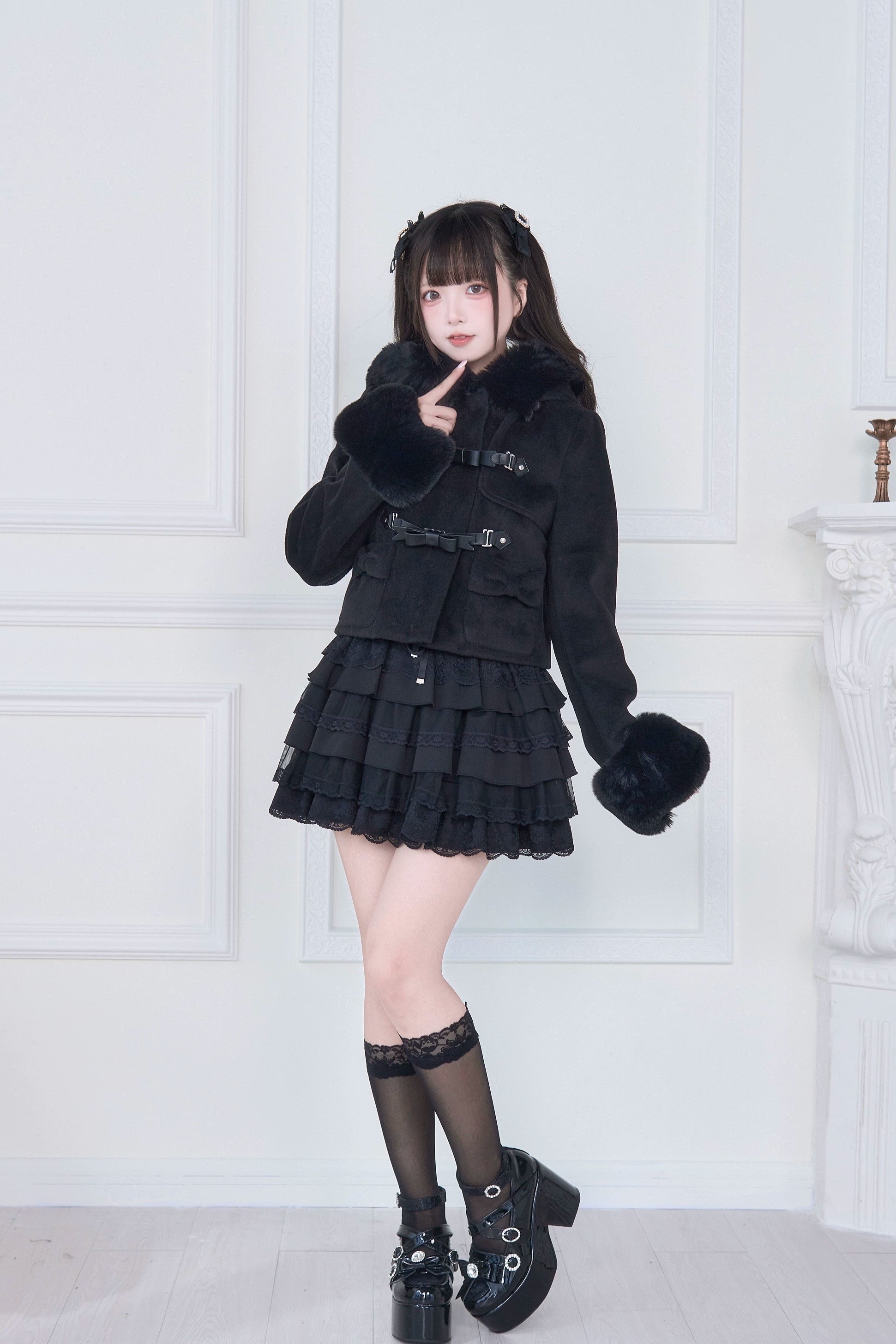 Pink hooded rousangata coat flat lay product photography, displaying full silhouette with white fur cuffs, hood, and bow details of jirai kei coat
