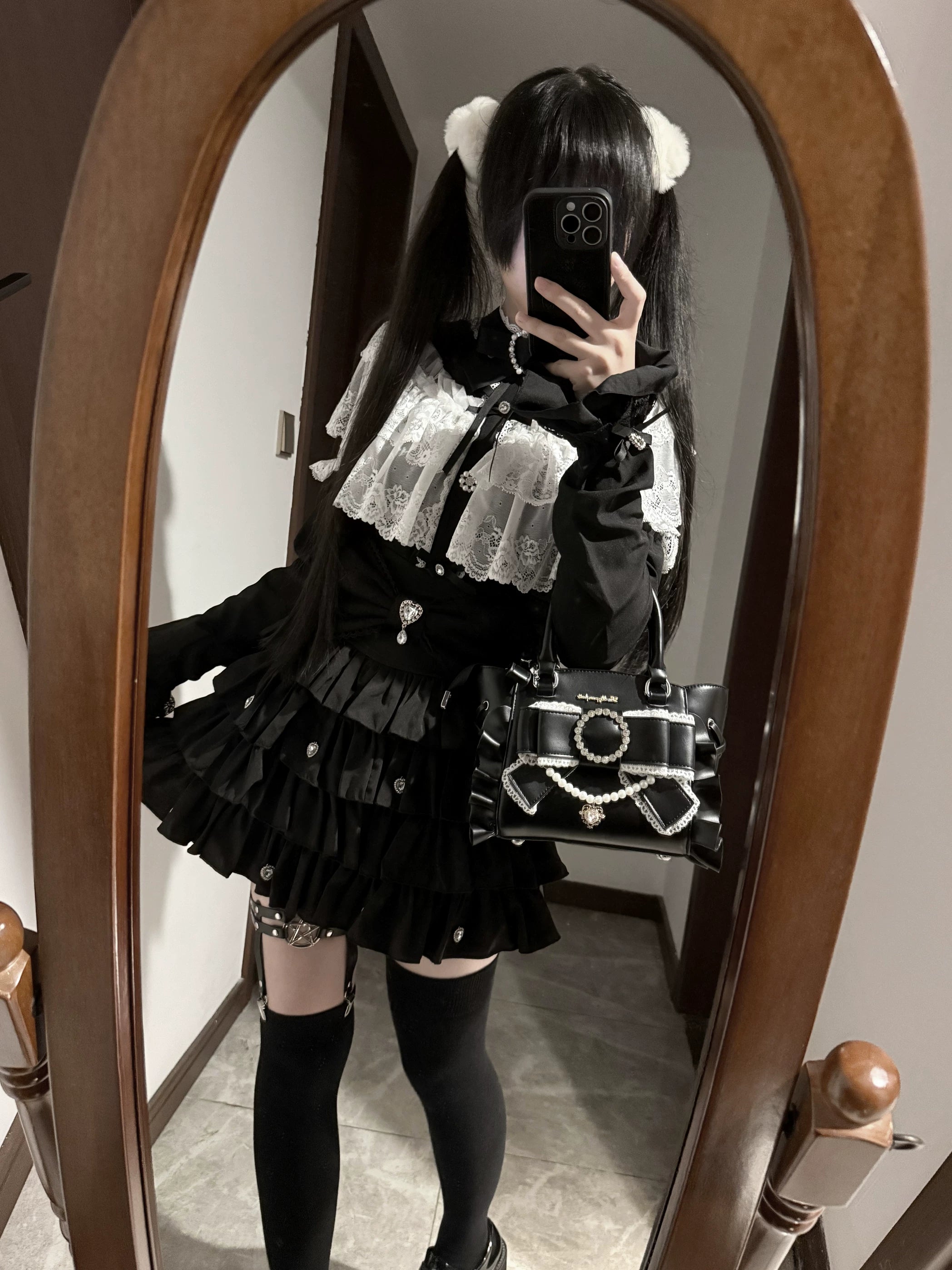 Black Jirai Kei square handbag in full-length mirror selfie worn by twin-tailed gothic lolita girl with coordinated outfit including thigh-high socks and layered jirai kei fashion