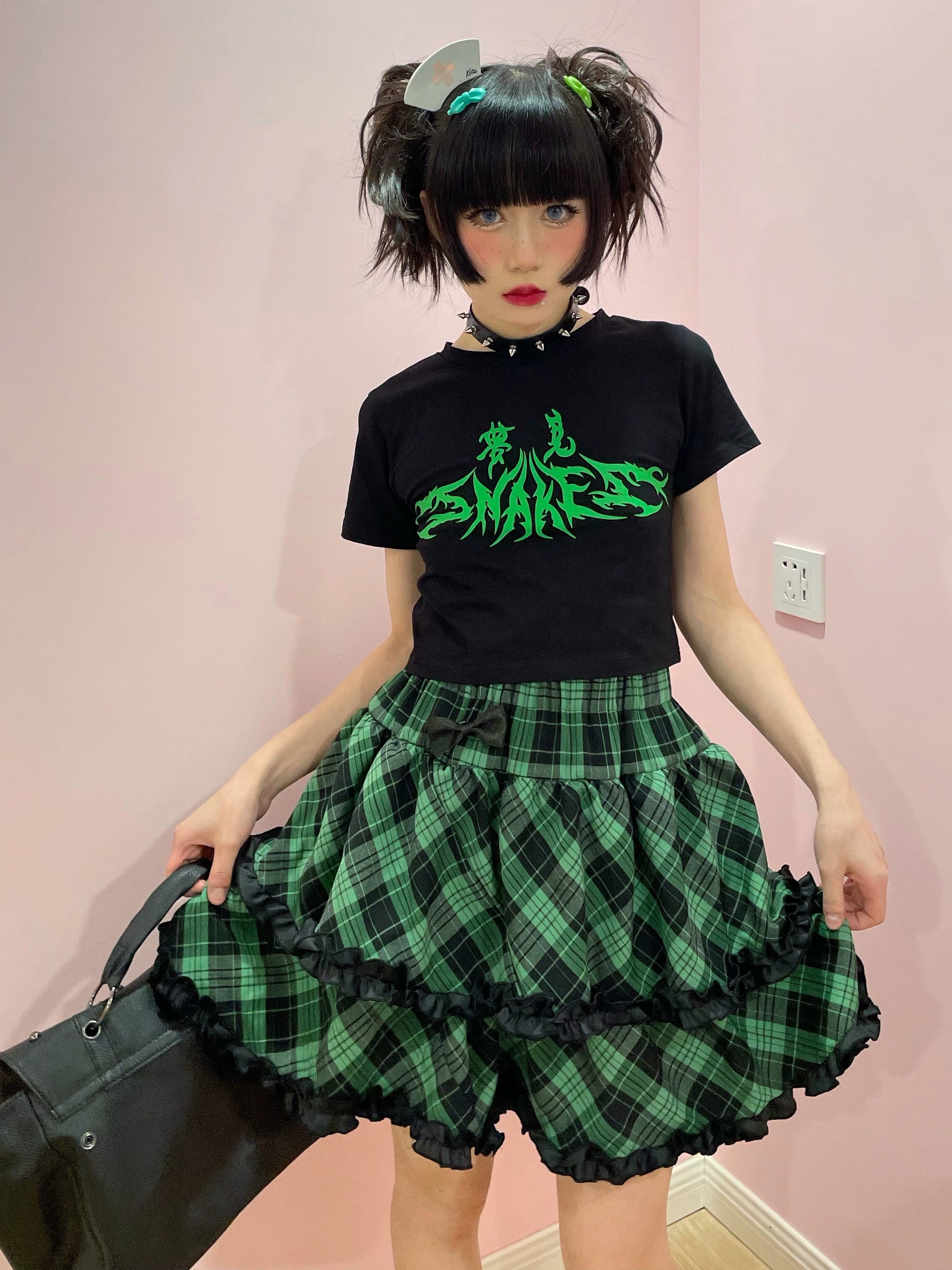 Pink-black plaid Jirai Kei ruffle skirt color option showcase, black frilled trim elegance, high-waist silhouette profile