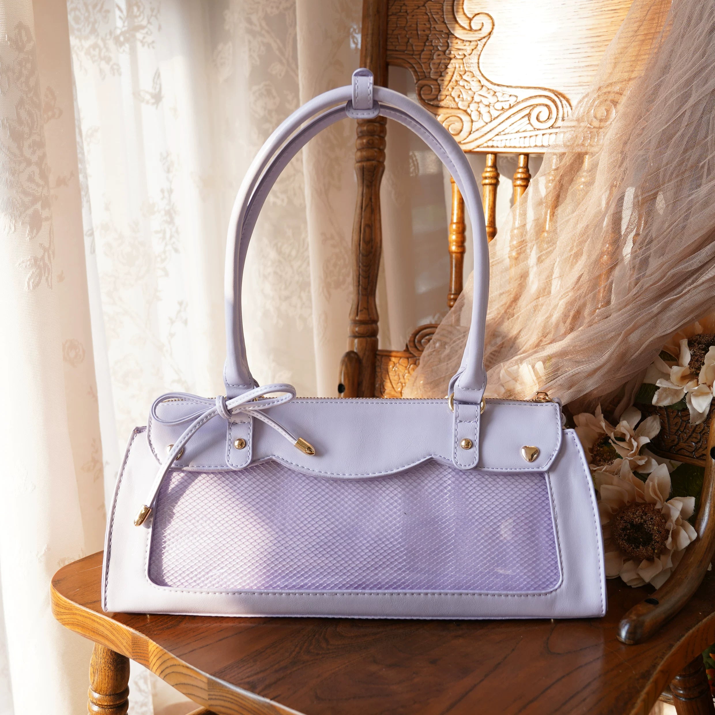 Purple baguette itabag with anime badge display window and detachable crossbody shoulder strap detail view