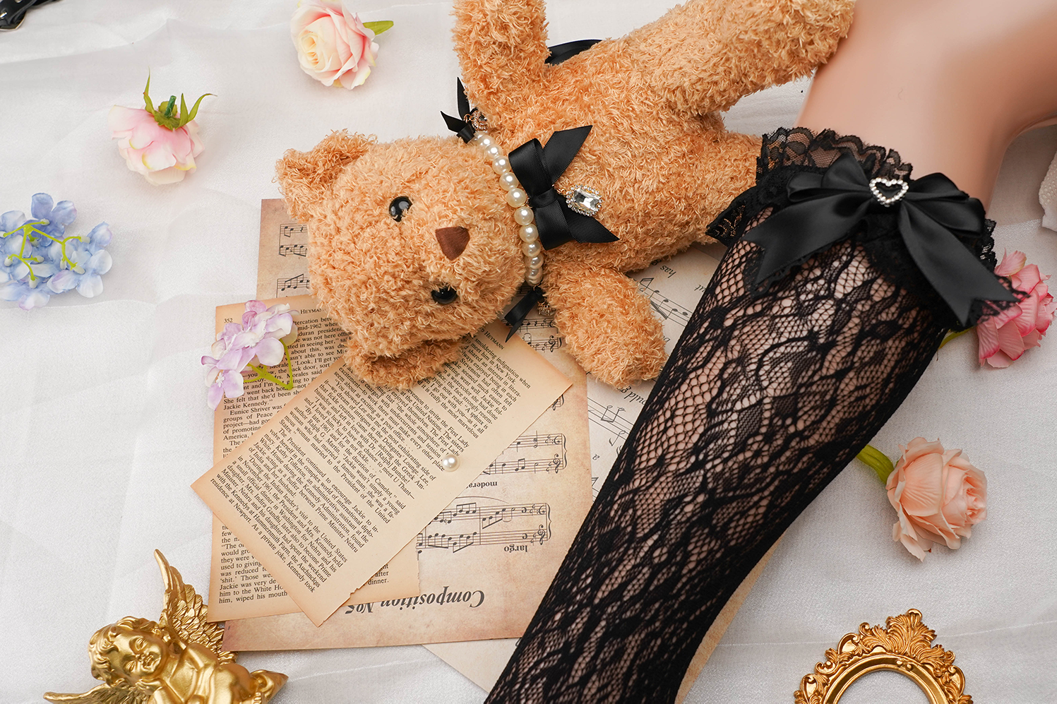 Jirai kei lace ankle socks with heart rhinestone accents and decorative satin bows showcasing delicate lace fabric and construction quality