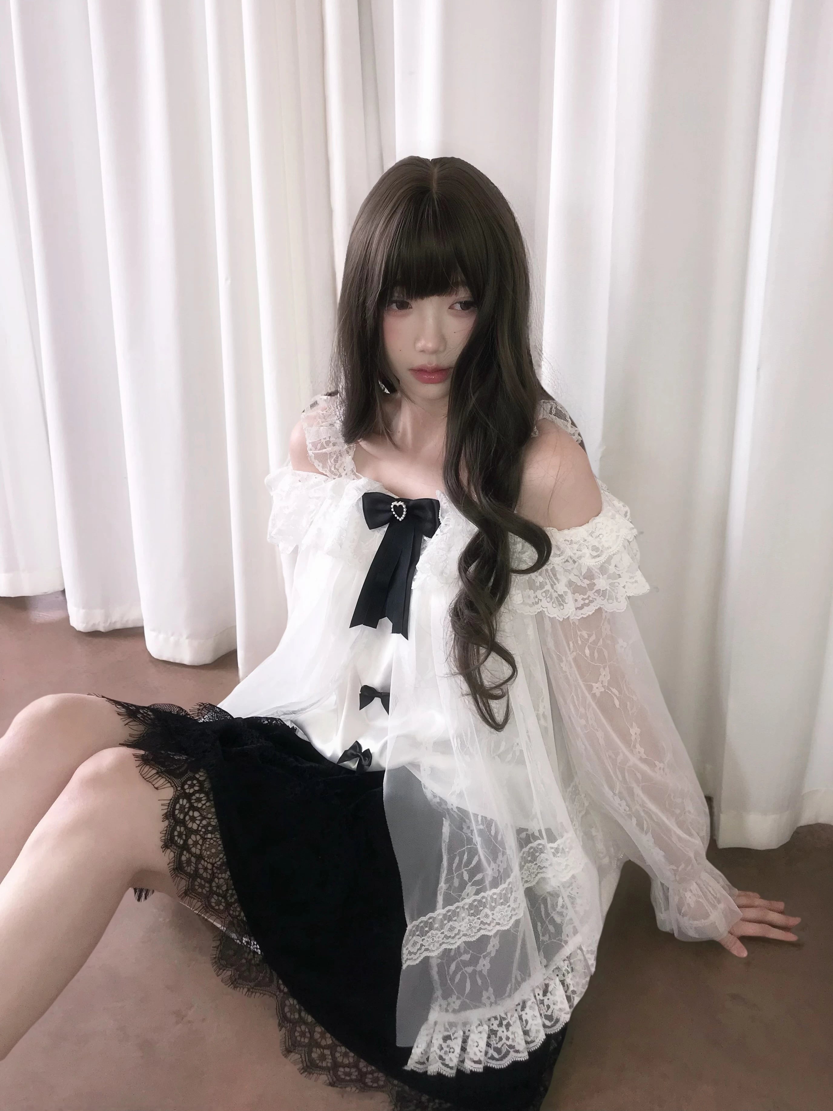Jirai Kei fashion styling guide showing off-shoulder blouse paired with swan feather tulle skirt, demonstrating complete alternative outfit coordination and aesthetic composition