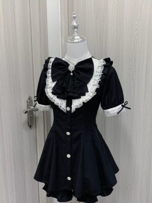 Short sleeve Jirai Kei dress with puffed sleeves displayed on mannequin, featuring pearl button front closure and delicate lace ruffled collar detail