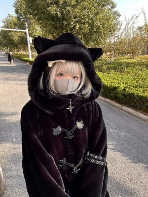 Dark black fuzzy cat ear hooded coat half-side view with blonde model face mask outdoor road styling horn toggles cross pendant
