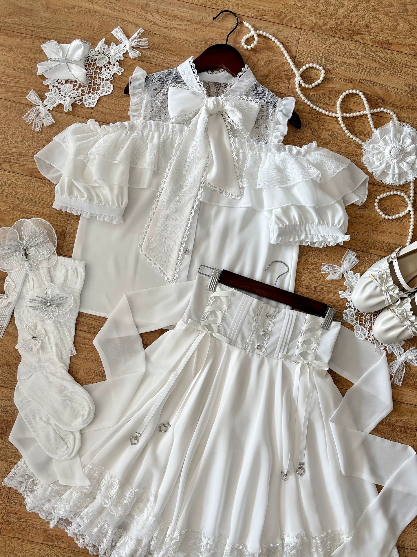 Off-shoulder Jirai Kei blouse and high-waist lace skirt set product details showing rhinestone embellishments