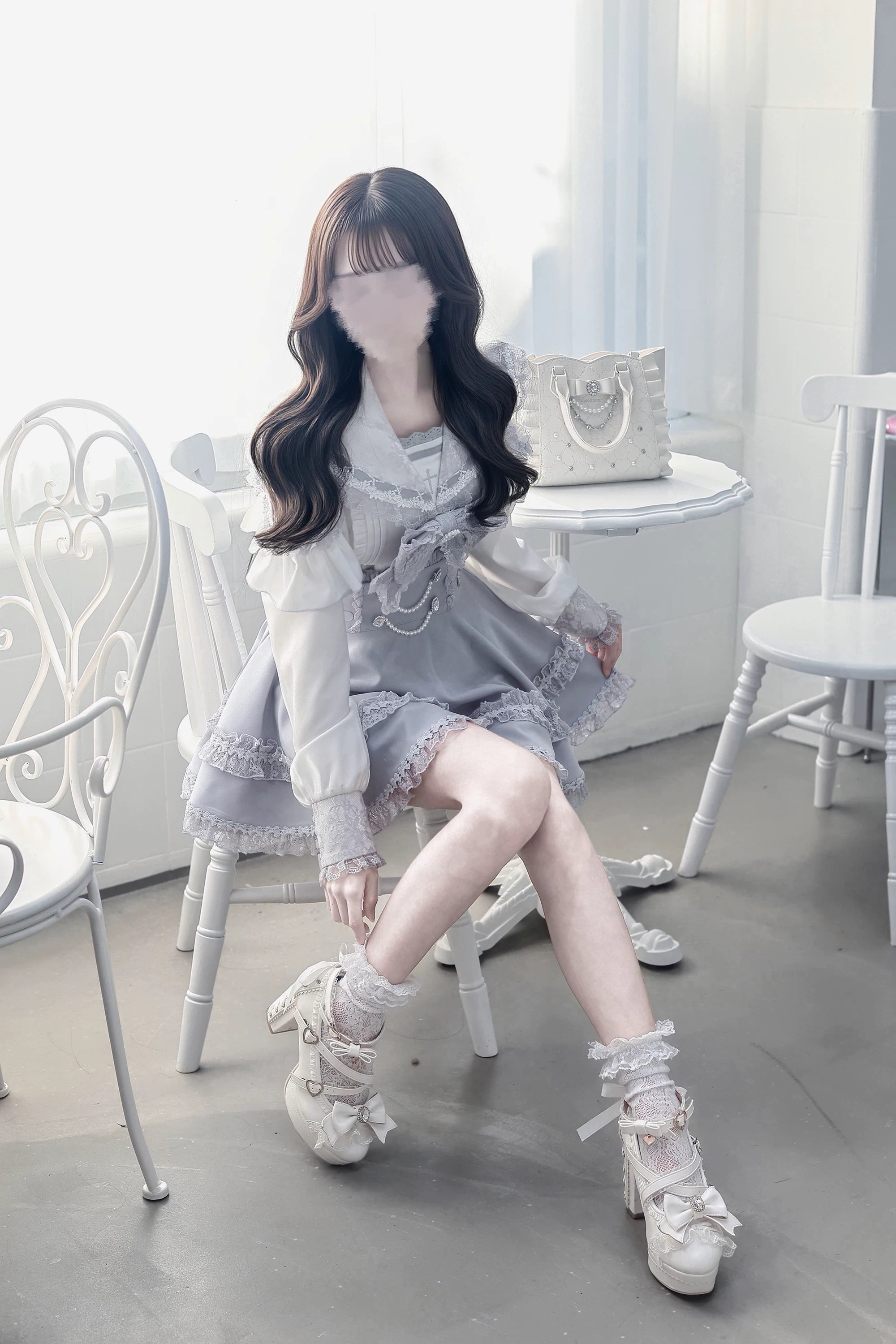Detachable bow tie component of ryousangata jirai kei sailor blouse shown separately demonstrating removable design feature for styling versatility