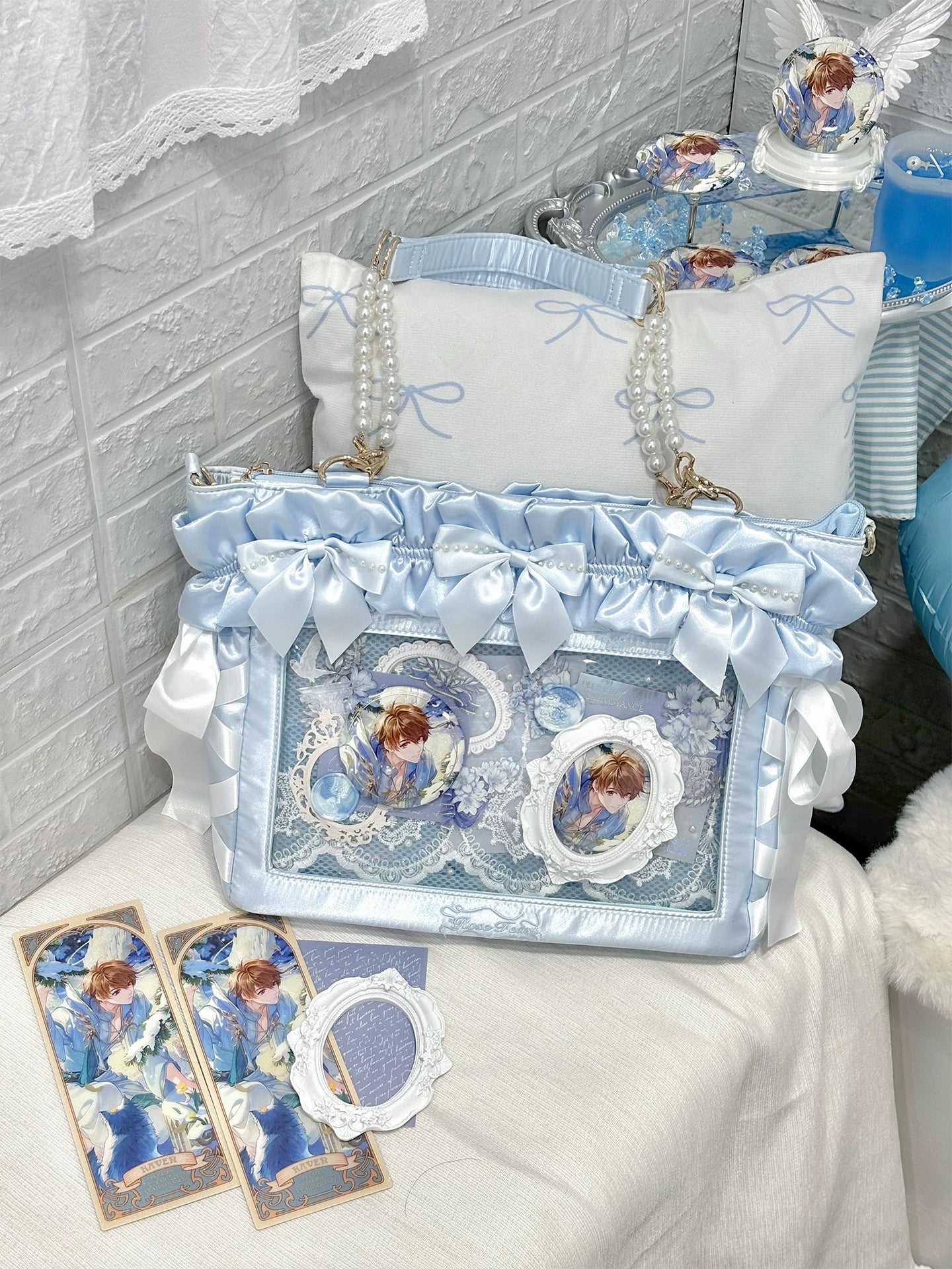 Jirai Kei laptop itabag silver variant showing metallic sheen finish with decorative bows and transparent collectible window