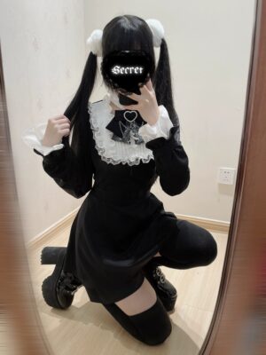 Black jirai kei long sleeve dress with lace ruffled collar bow chest decoration lace cuffs mirror selfie squatting pose