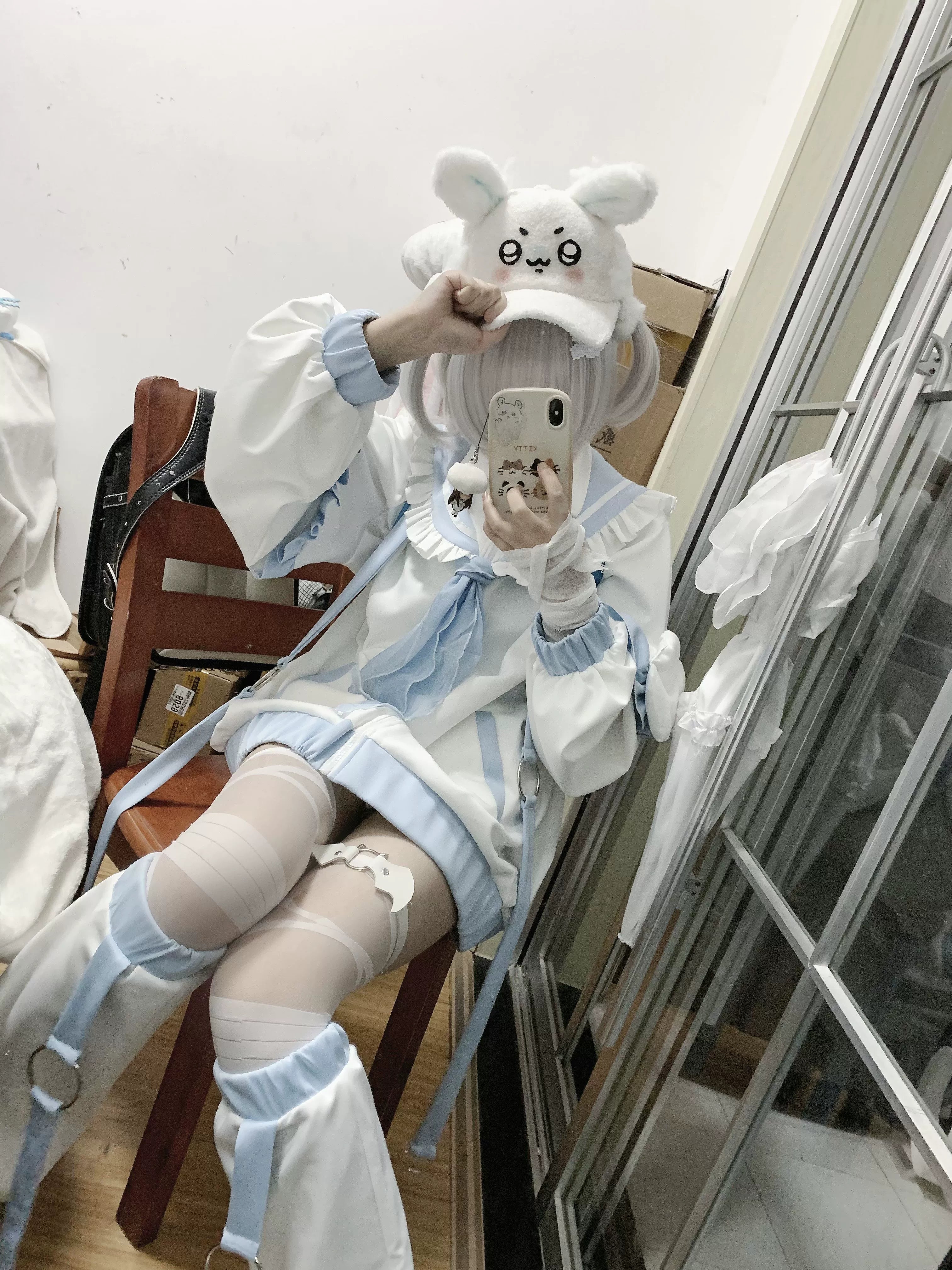 Tenshi Kaiwai sailor jacket with plush bunny hat mirror selfie sitting view lace thigh-high stockings whimsical celestial look