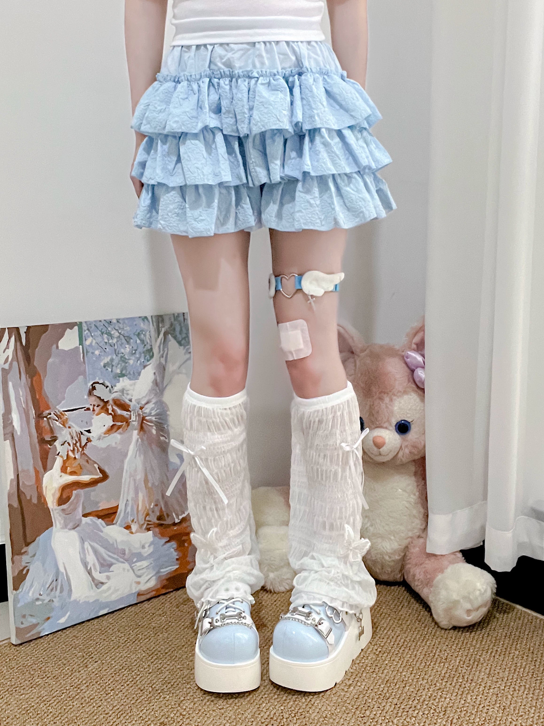 Jirai Kei white mesh leg warmers with blue bow leg accessory blue ruffle skirt full lower body studio view