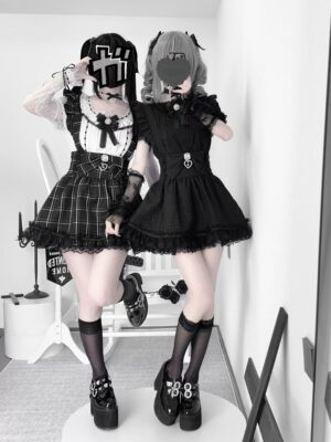 Jirai Kei blouse overhead mirror selfie view showcasing dual-layer short sleeves with sheer tulle overlay, ruffled lace collar, and detachable bow aesthetic in black and white color scheme