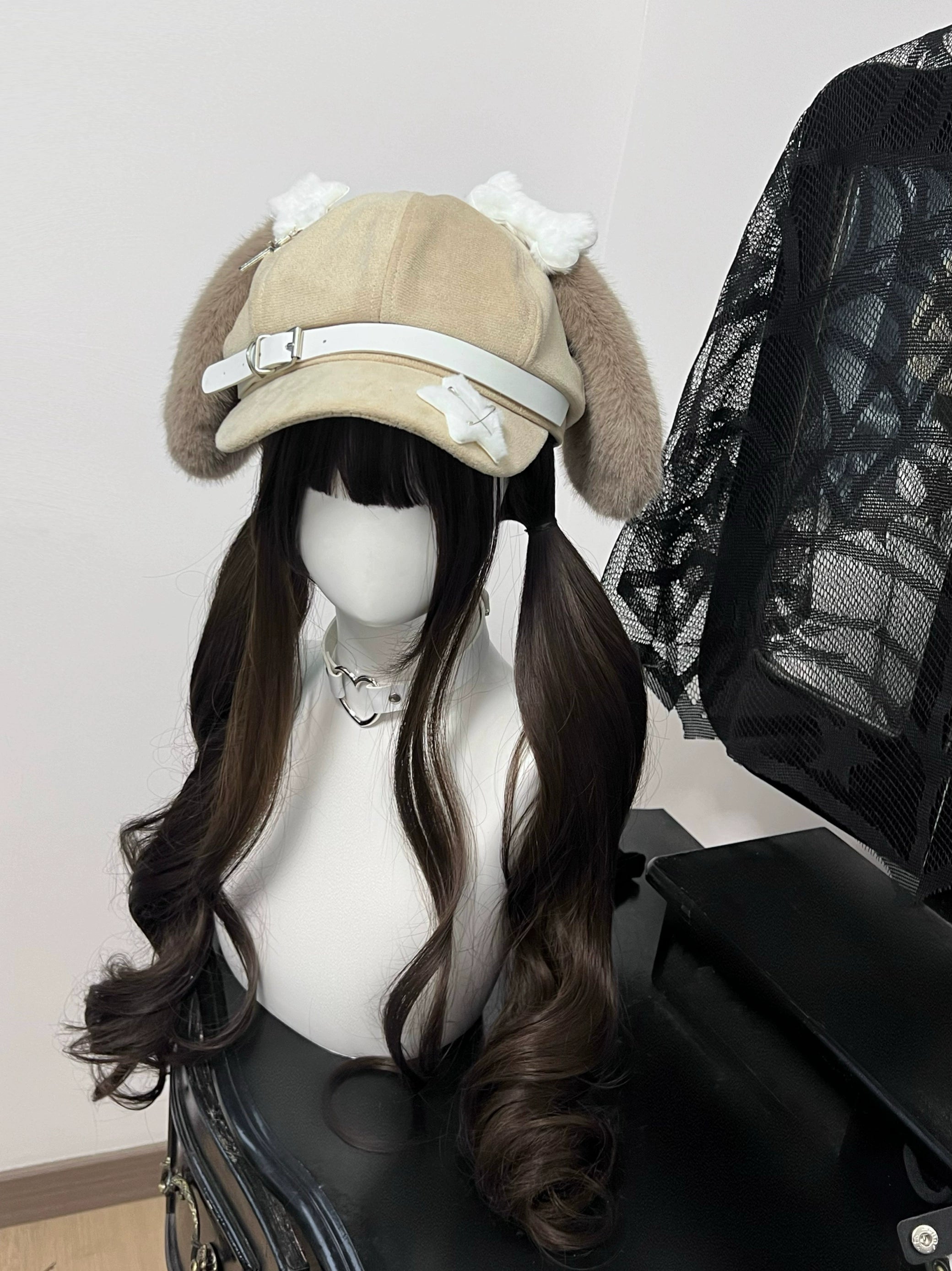 Jirai Kei brown puppy ear hat with leather buckle star sticker details on mannequin dark wig display