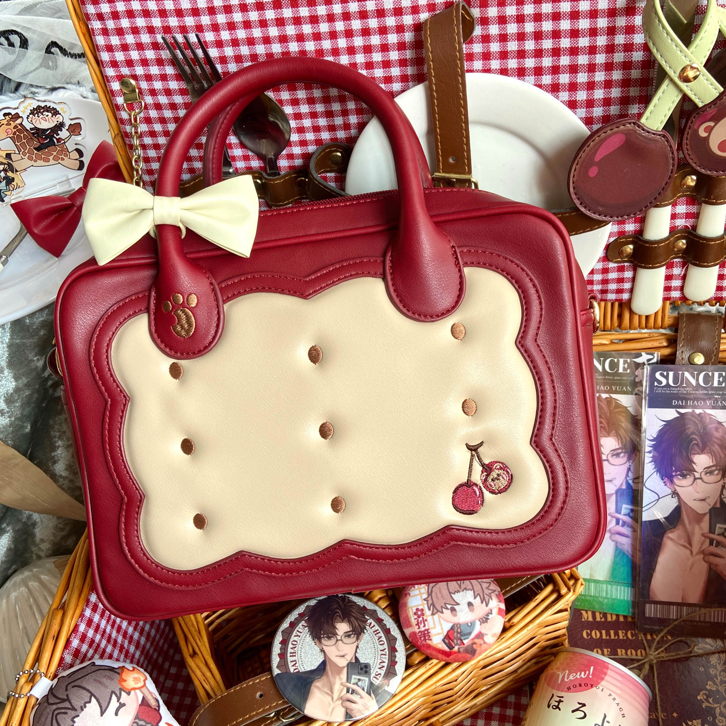 Cherry bear cookie Jirai Kei bag detail shot showing strawberry heart buckle hardware and bow embellishment craftsmanship