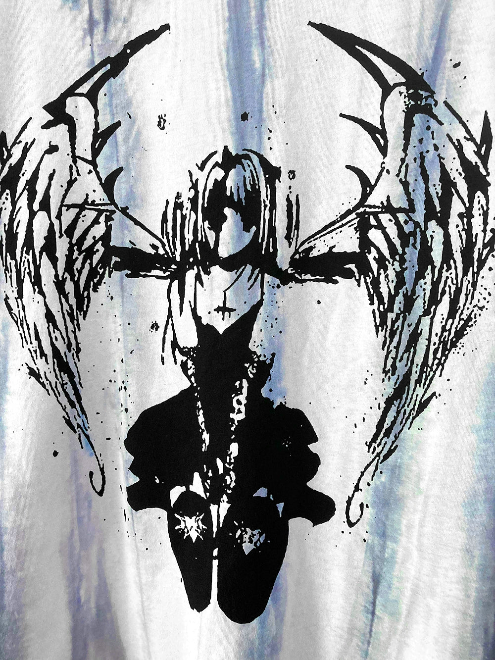Shoulder and upper back area of tie-dye gothic jirai kei angel t-shirt showing garment structure and oversized silhouette proportion