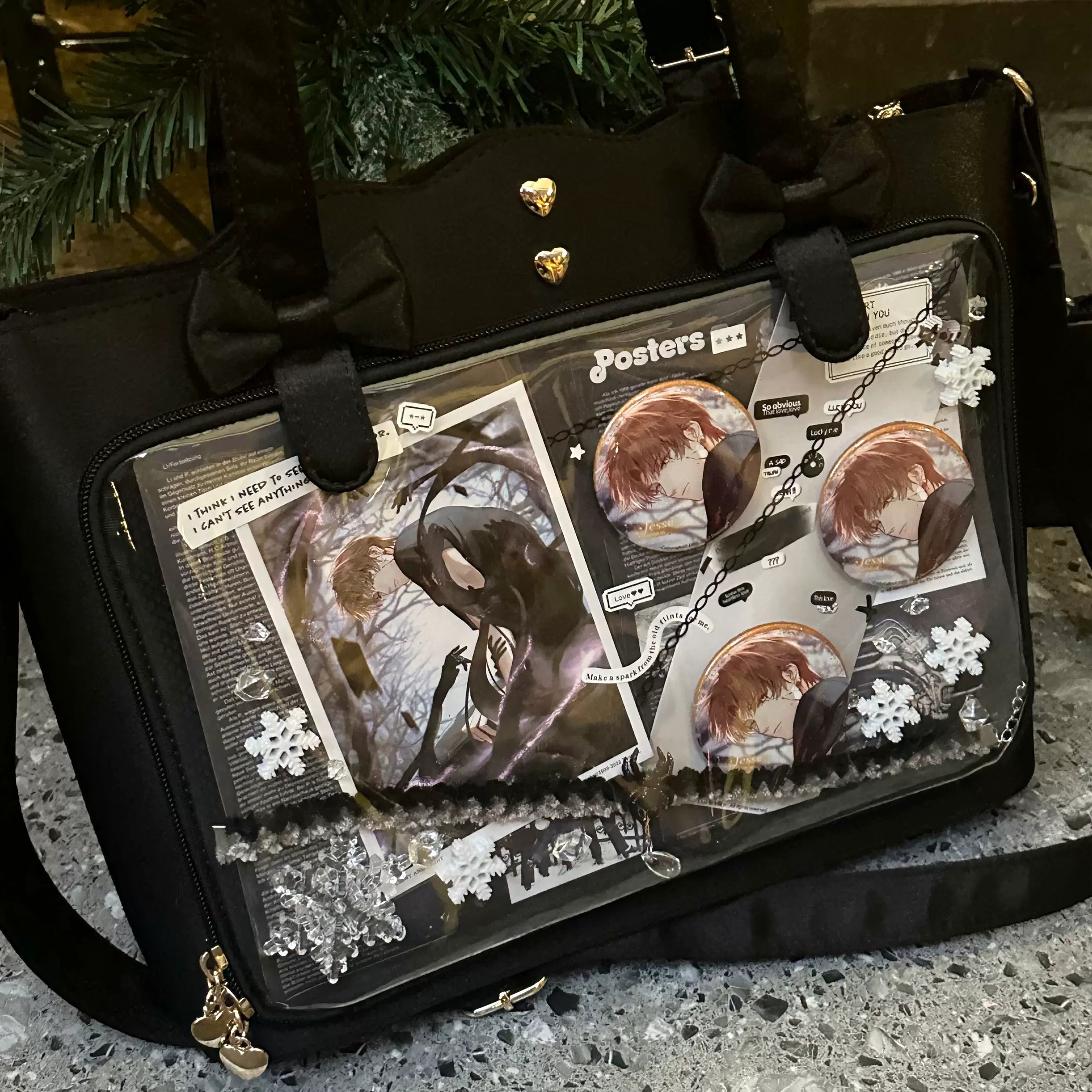 Black Jirai Kei ita bag color variant with large capacity transparent anime badge display, heart metal adjustable buckle, wavy edge tote design, and bow-adorned dual carrying shoulder straps