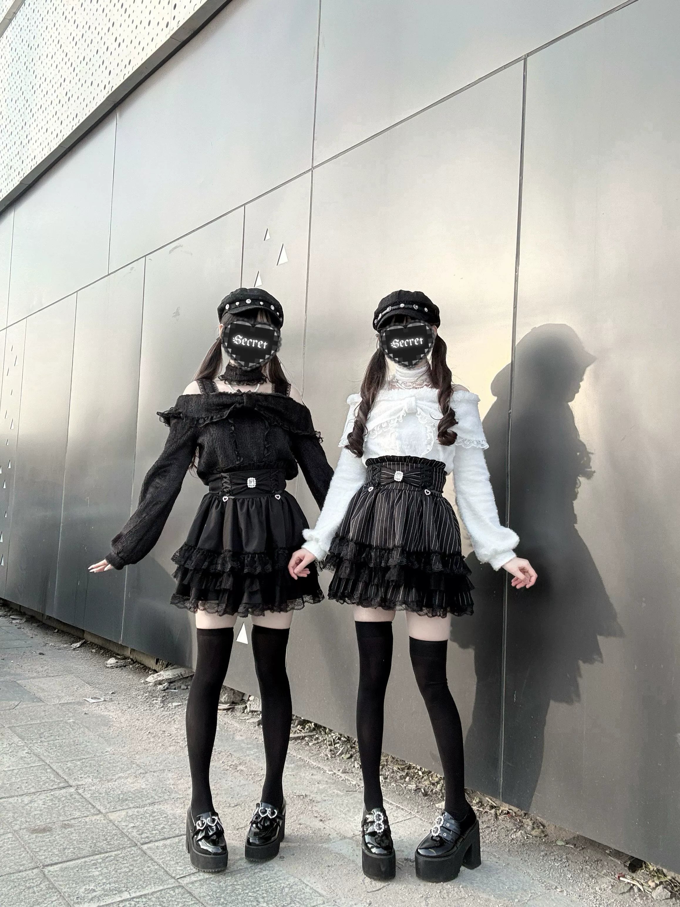 Off-shoulder plush fleece top with dramatic oversized bow detail emphasizing Jirai Kei's philosophical approach to avant-garde fashion