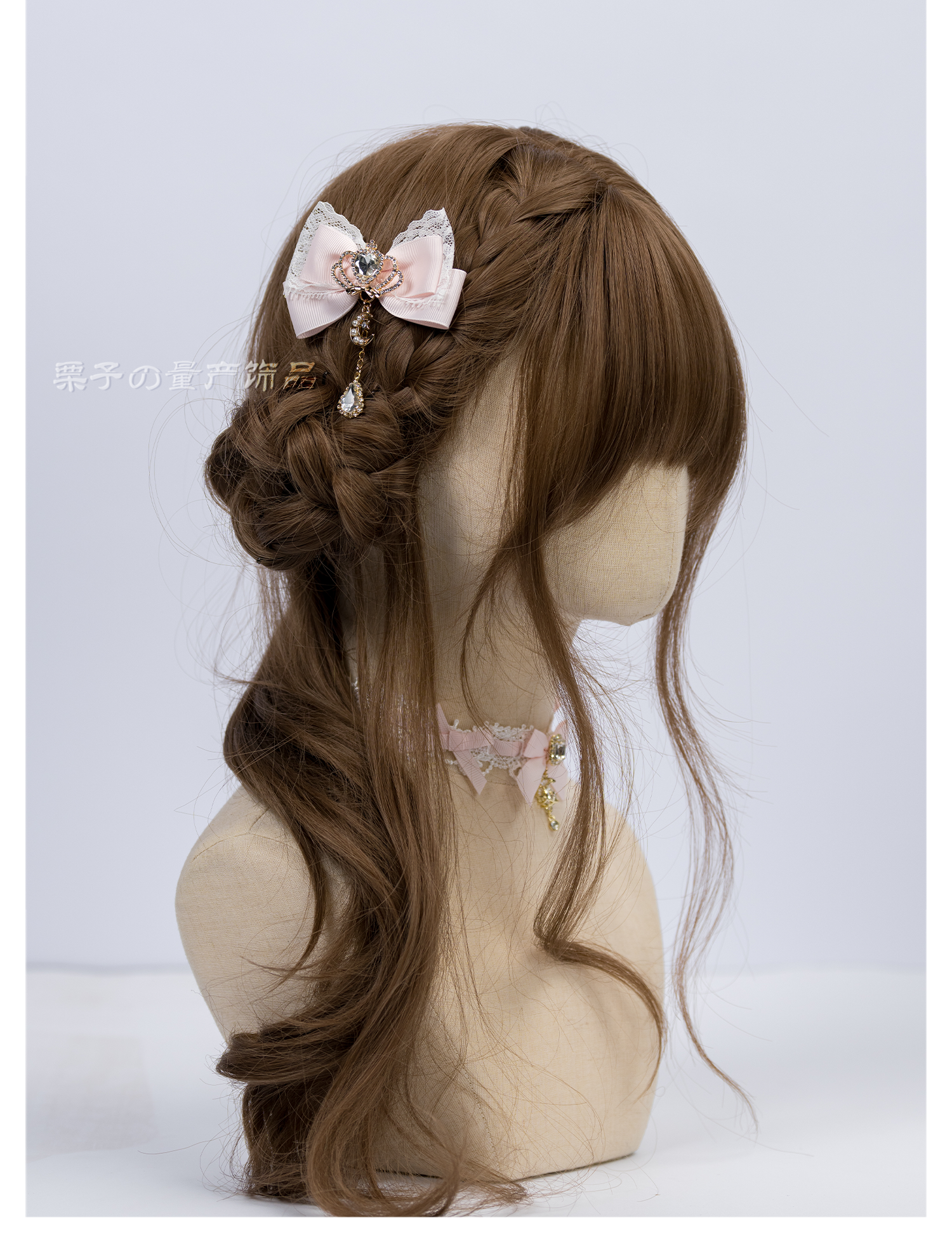 Pink Jirai Kei single bow hair clip with rhinestone charm accent close-up detail shot styling