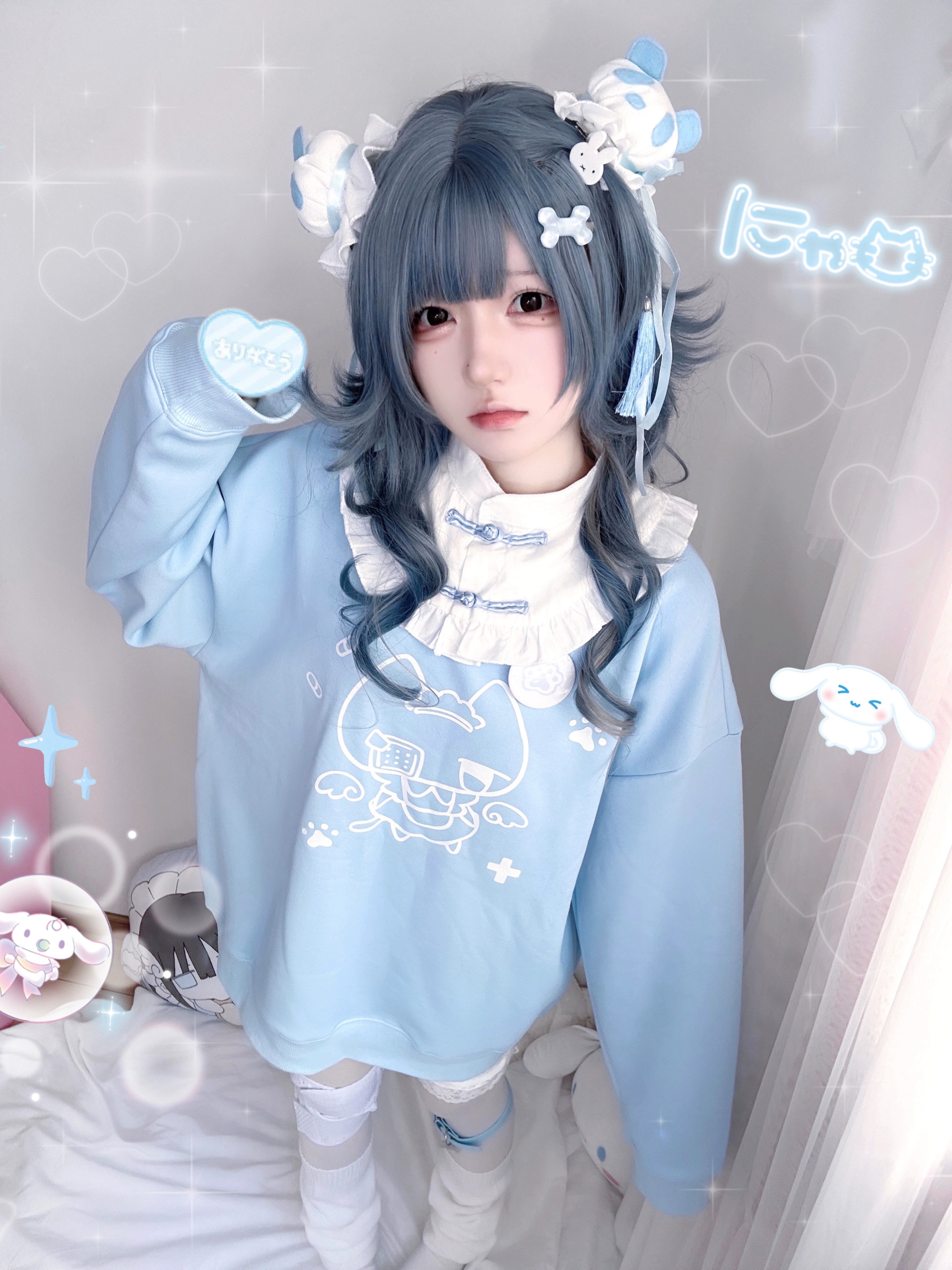 Front close-up of light blue cat print Jirai Kei sweatshirt with cute cartoon cat chest motif, kawaii aesthetic, and white collar trim details