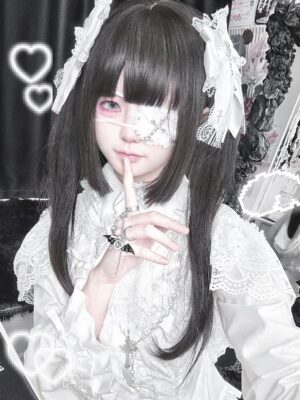 White lace bow Jirai Kei hair clip with cross pendant and heart rhinestone, styled by lolita cosplayer wearing matching white lace outfit