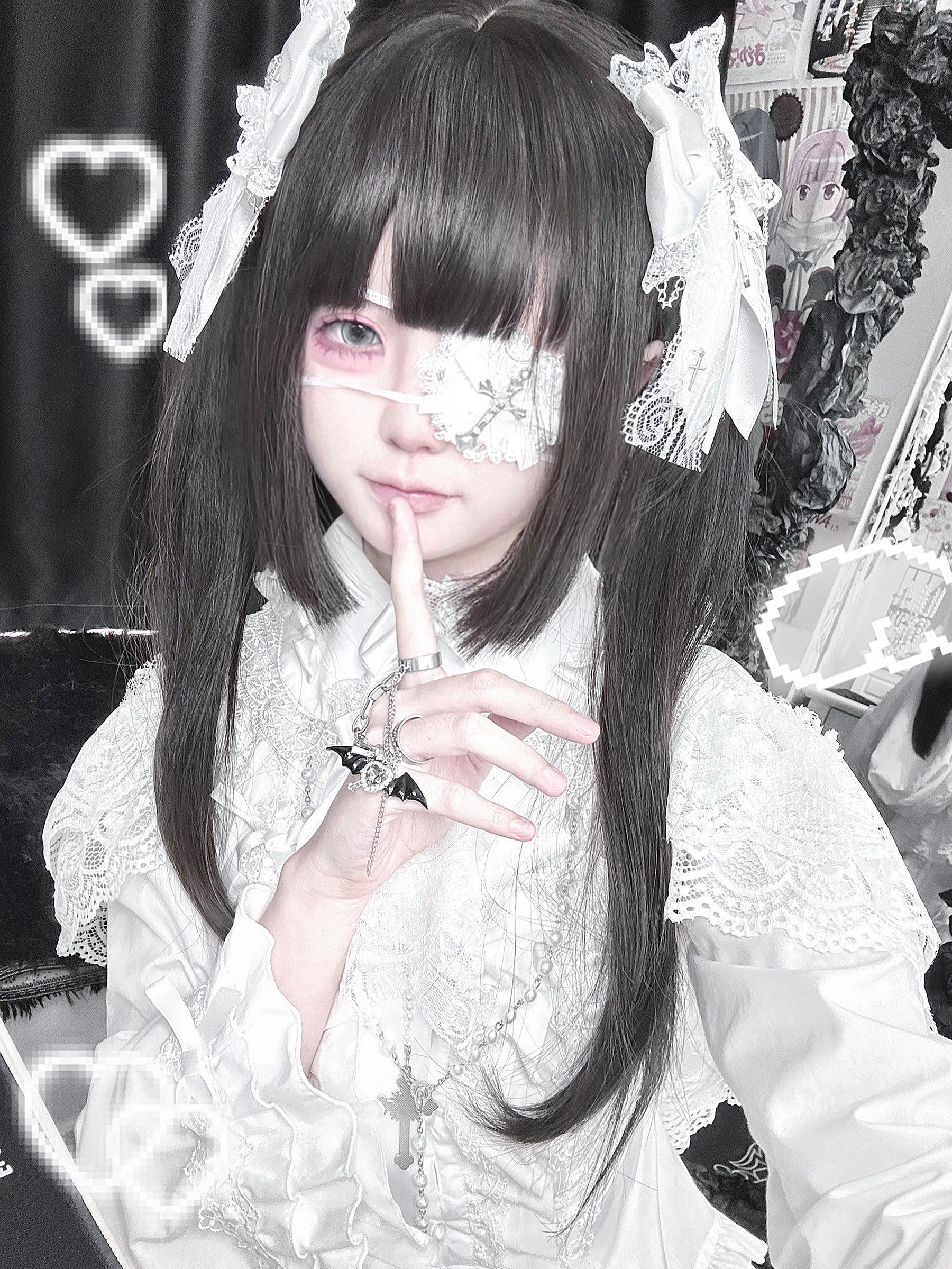 White lace bow Jirai Kei hair clip with cross pendant and heart rhinestone, styled by lolita cosplayer wearing matching white lace outfit