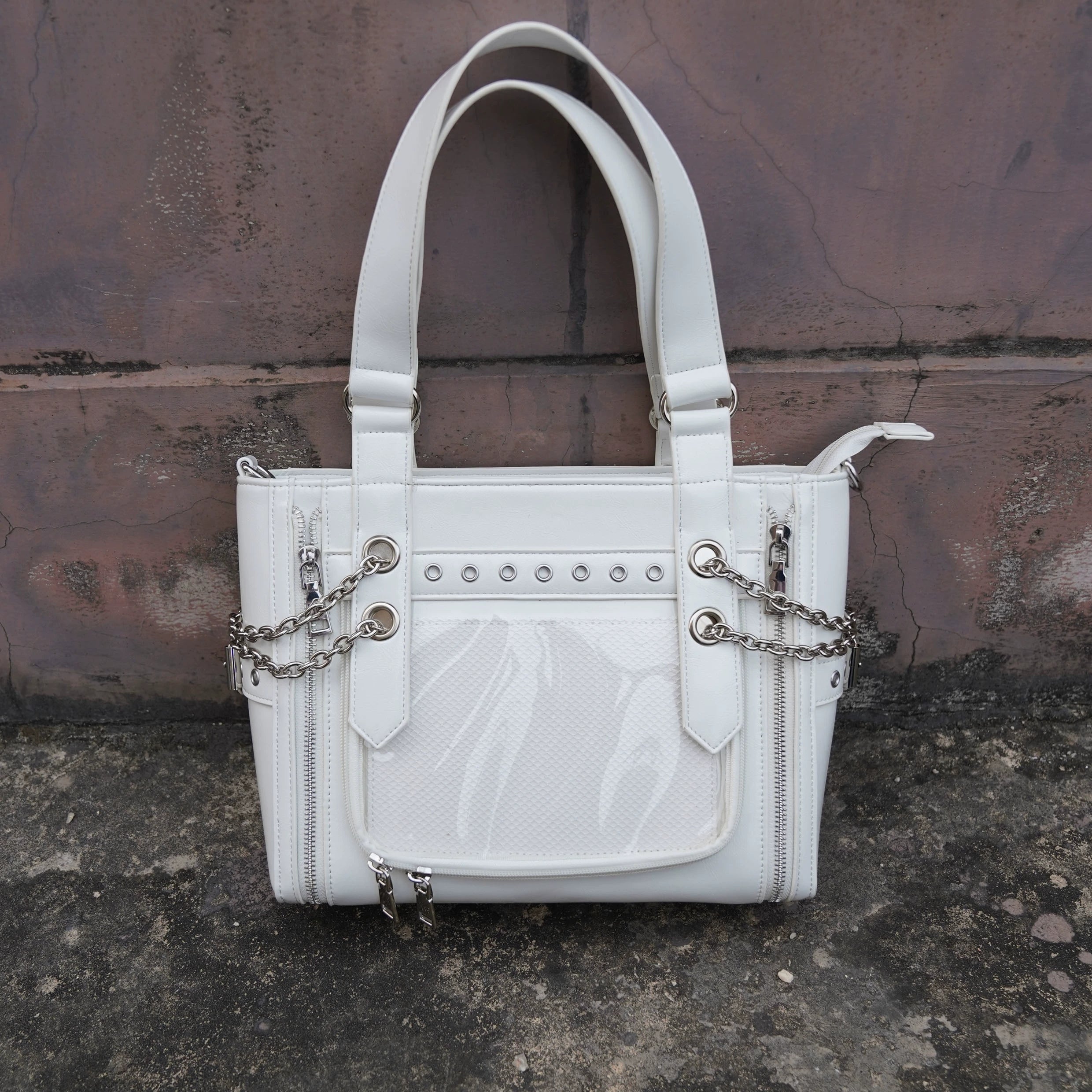 White denim Jirai Kei ita bag bold statement piece with metal chains and anime character display window