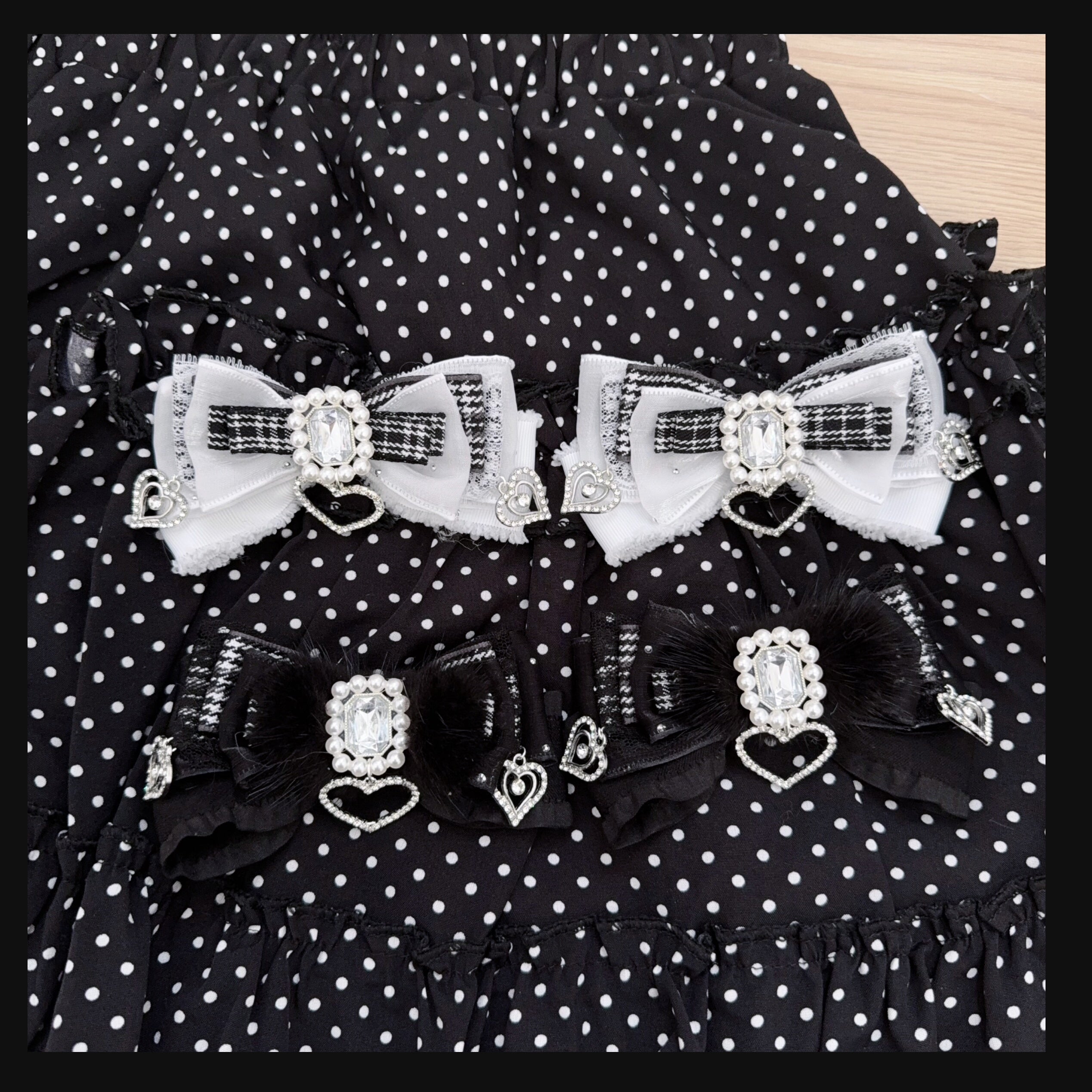 Jirai Kei fluffy black plush bow hair clips paired with white houndstooth clips displaying full collection with sparkling rhinestones and delicate lace detailing