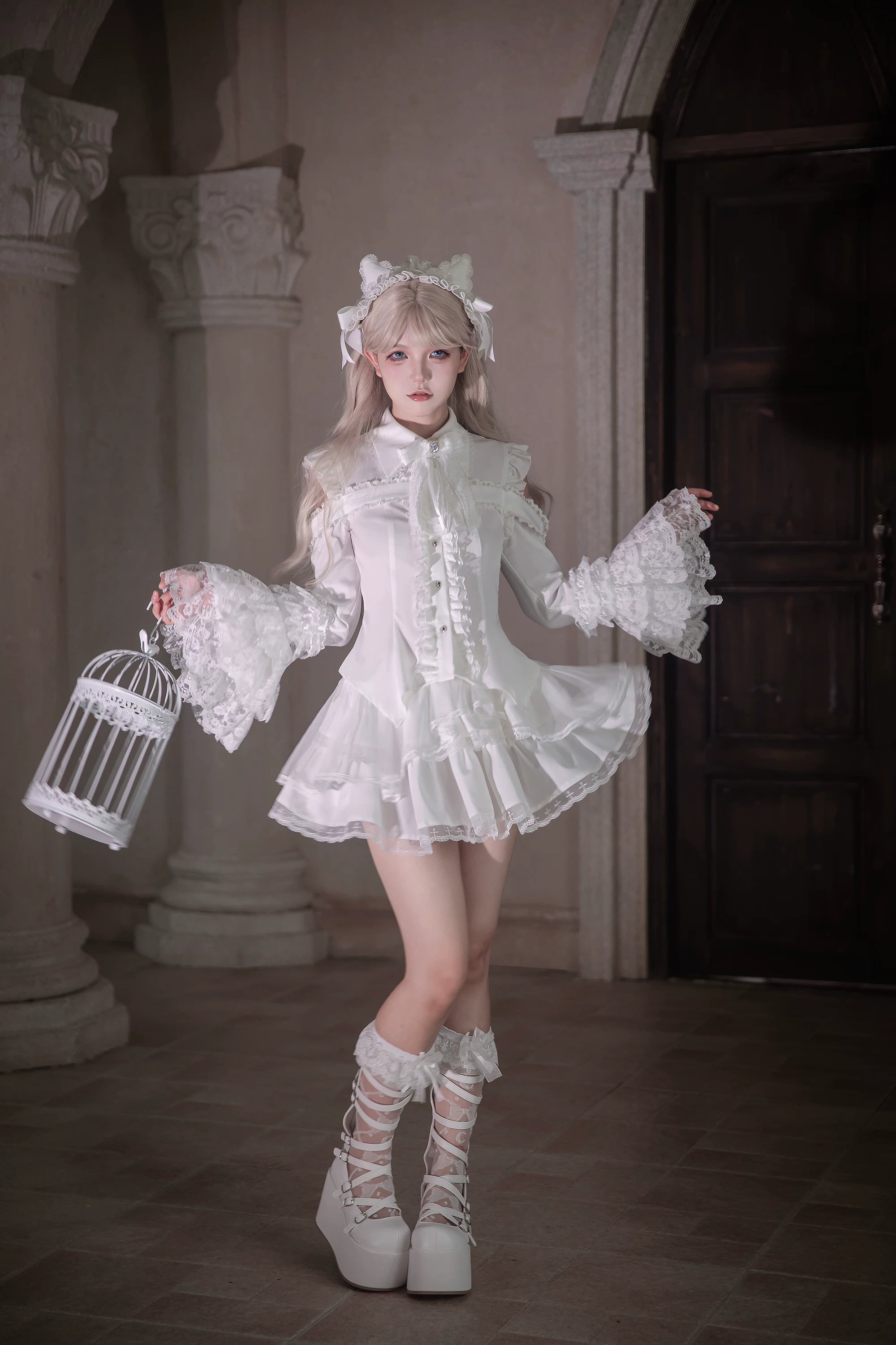 White gothic lolita hime sleeve blouse and tiered lace skirt set jirai kei two-piece outfit full front view model
