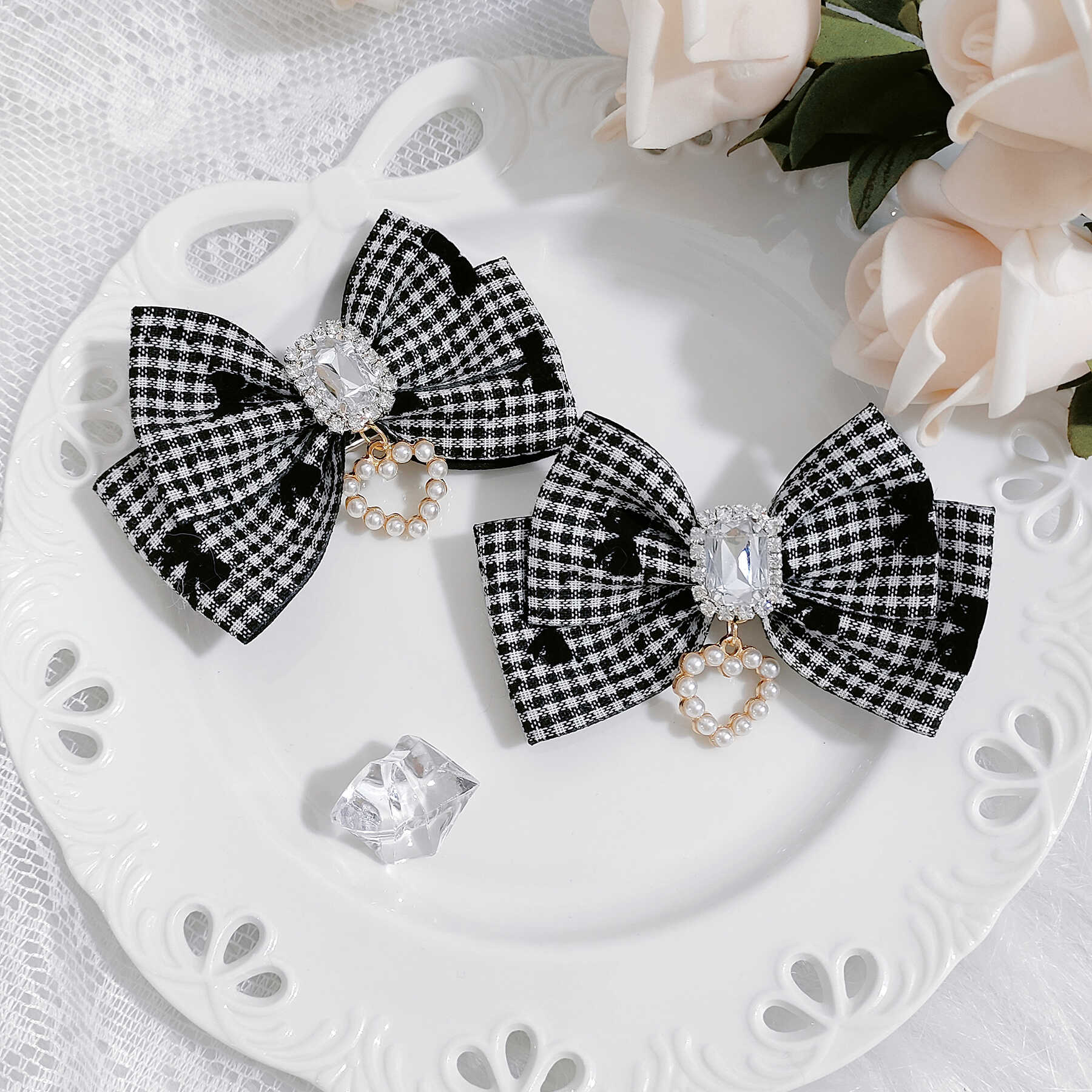 Stylish mini black and white houndstooth Jirai Kei hair clips with tiny bow accents, rhinestone and pearl pendant embellishments, street fashion hair accessory set