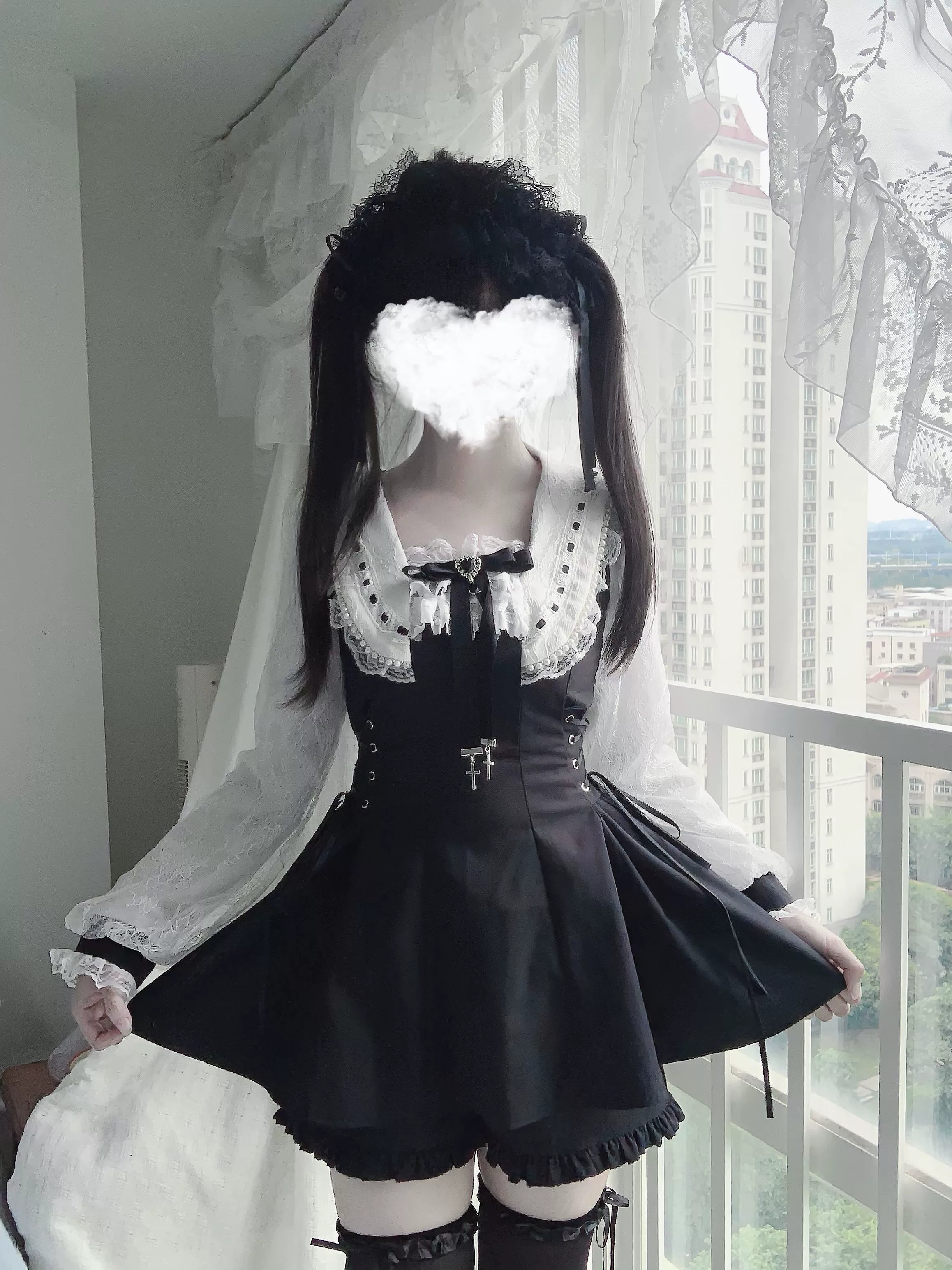 Full ensemble styling on model with coordinated accessories hair styling demonstrating complete Jirai Kei aesthetic vision