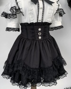 Pure black petal-hem Jirai Kei skirt with layered lace trim and heart-shaped decorative buttons flat product shot